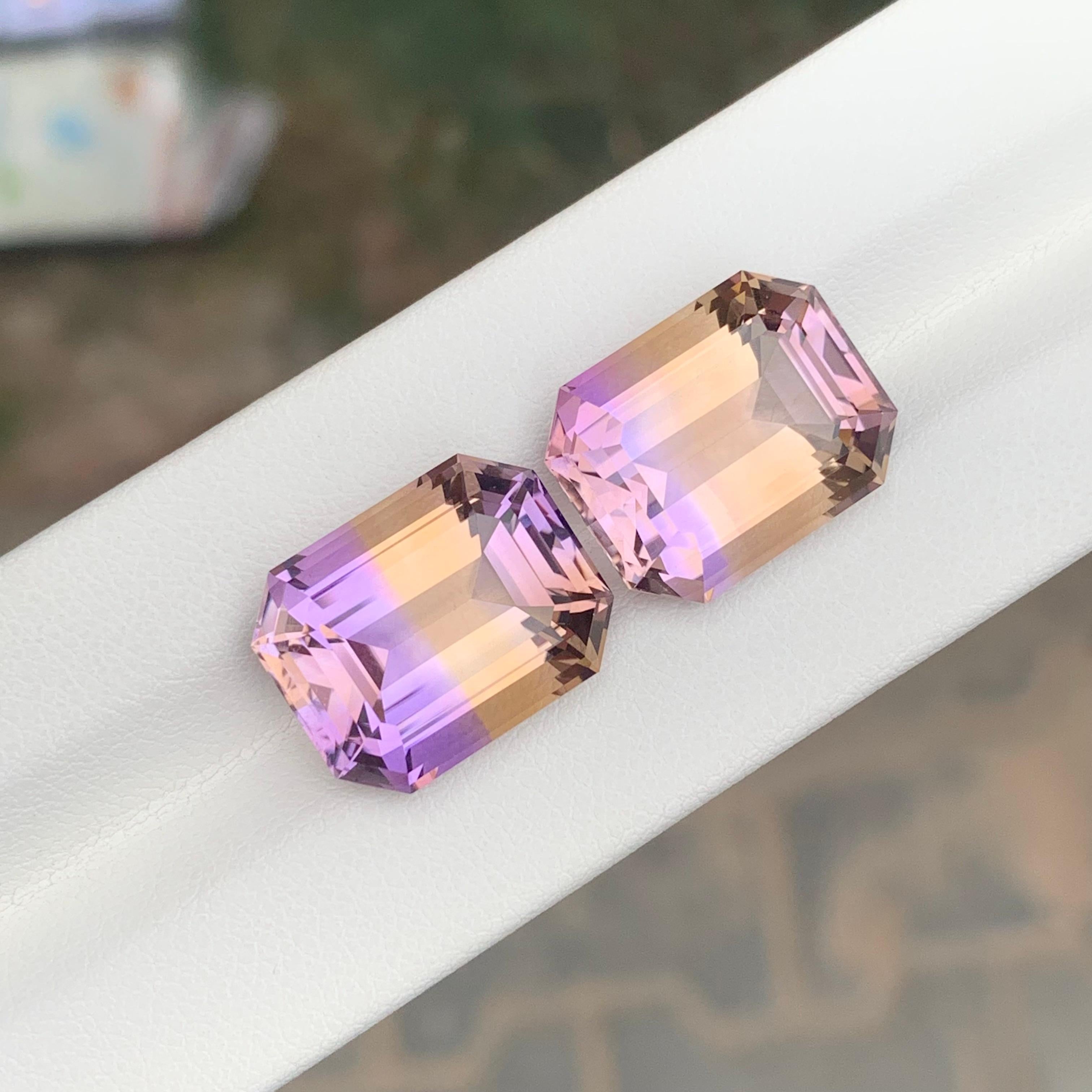 Faceted Ametrine Pair 

Weight: 26.00 Carats
Dimension: 16.3 x 12.9 x 9.1 Mm
Shape: Emerald 
Color: Purple & Yellow
Treatment: Non
Certificate: On Client Demand
.
Ametrine is a unique and striking gemstone that combines both amethyst and citrine in