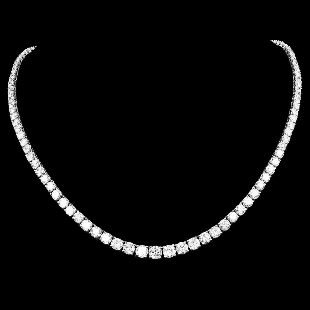 26.00 Carats Natural Diamond Graduating Riviera Tennis Necklace, crafted in fine 14K white gold.

This exquisite necklace features 112 brilliant round diamonds, graduating from 0.85 carat to 0.08 carat. Creating a mesmerizing display of light and