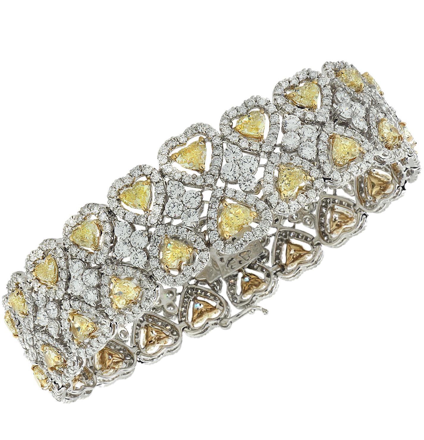 Modern 26.04 Carat Fancy Yellow Heart Shape Diamond Halo Bracelet For Sale