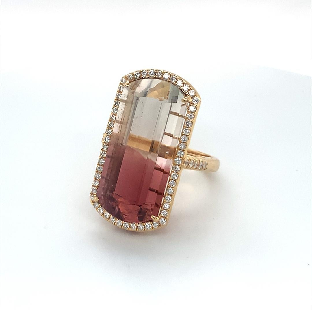 26.05 Natural Tourmaline with Diamond Halo set in 18 Kt yellow gold. 