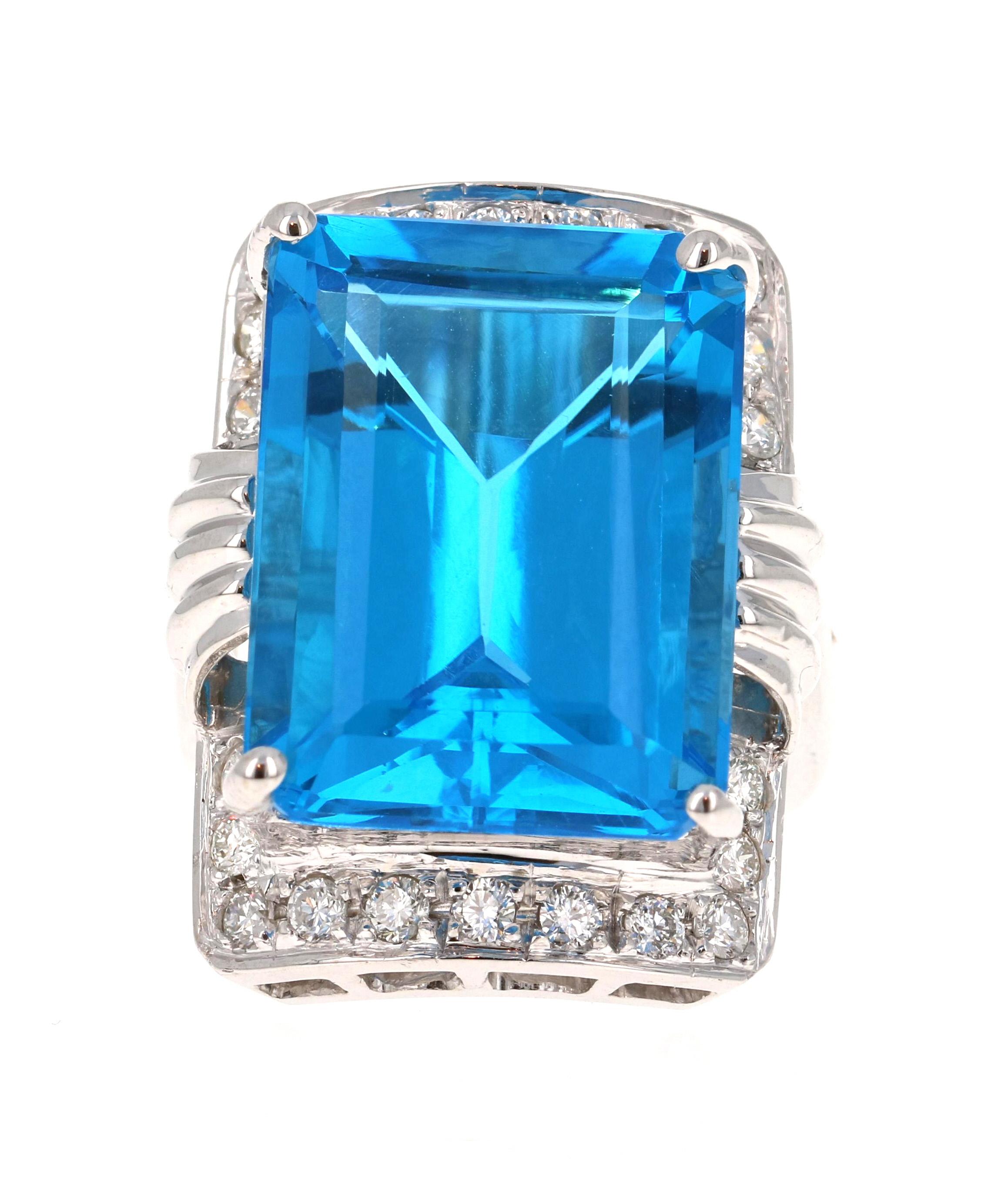 Contemporary 26.07 Carat Emerald Cut Blue Topaz Diamond White Gold Cocktail Ring For Sale
