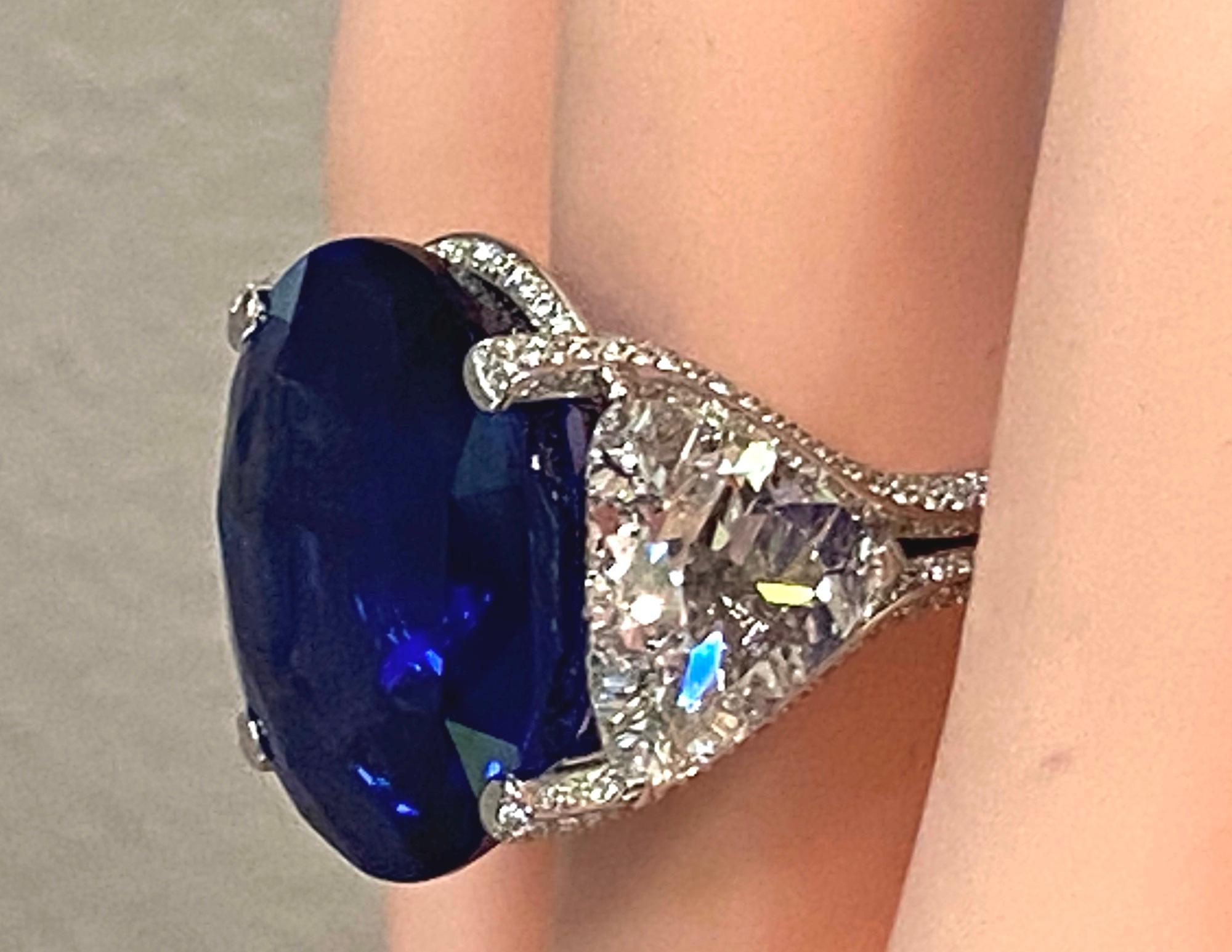 26.08 Carat Oval Shaped Blue Sapphire with 2 GIA Side Trillion Diamonds For Sale 2