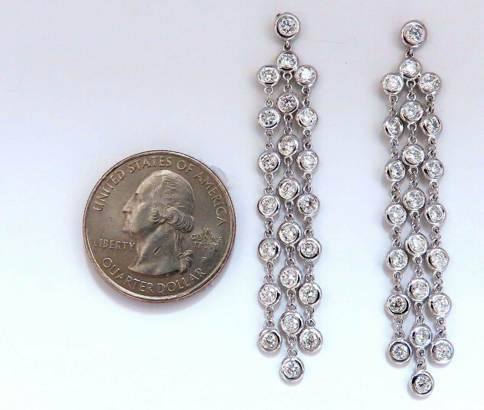 Three Tiered Dangles

2.60ct. Natural diamonds  earrings.

Rounds, Full cut brilliants.

G- color Vs-2 Clarity. 

Excellent detail.

14kt. white gold

7.1 grams.

2.25 inch Long

Butterfly, Comfortable push backs 

$8,000 Appraisal Certificate will
