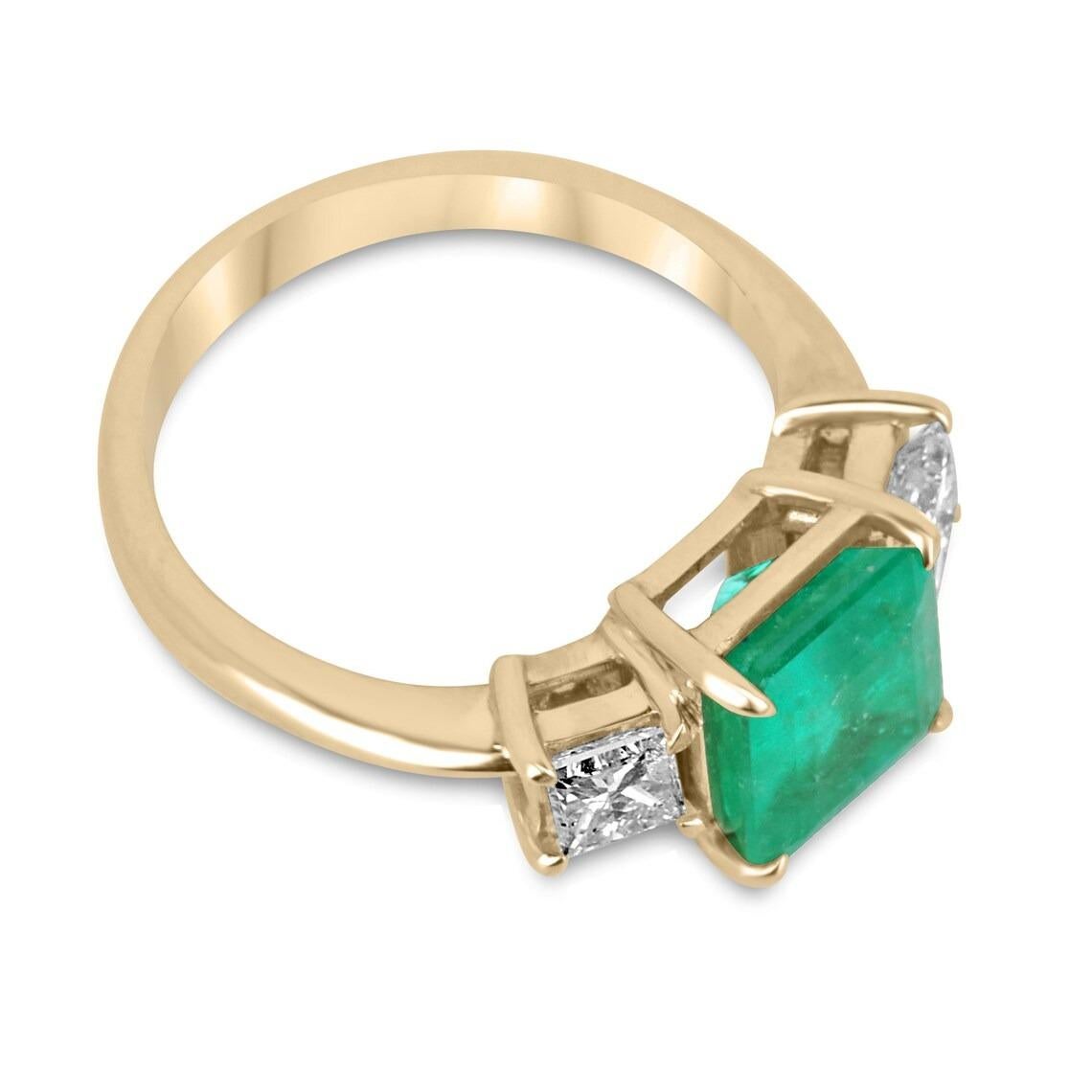 Indulge in the timeless allure of Colombian emeralds and diamonds with this breathtaking engagement, statement, or right-hand ring. Expertly handcrafted in lustrous 14K gold, this masterpiece showcases a stunning 2.20-carat natural Colombian emerald
