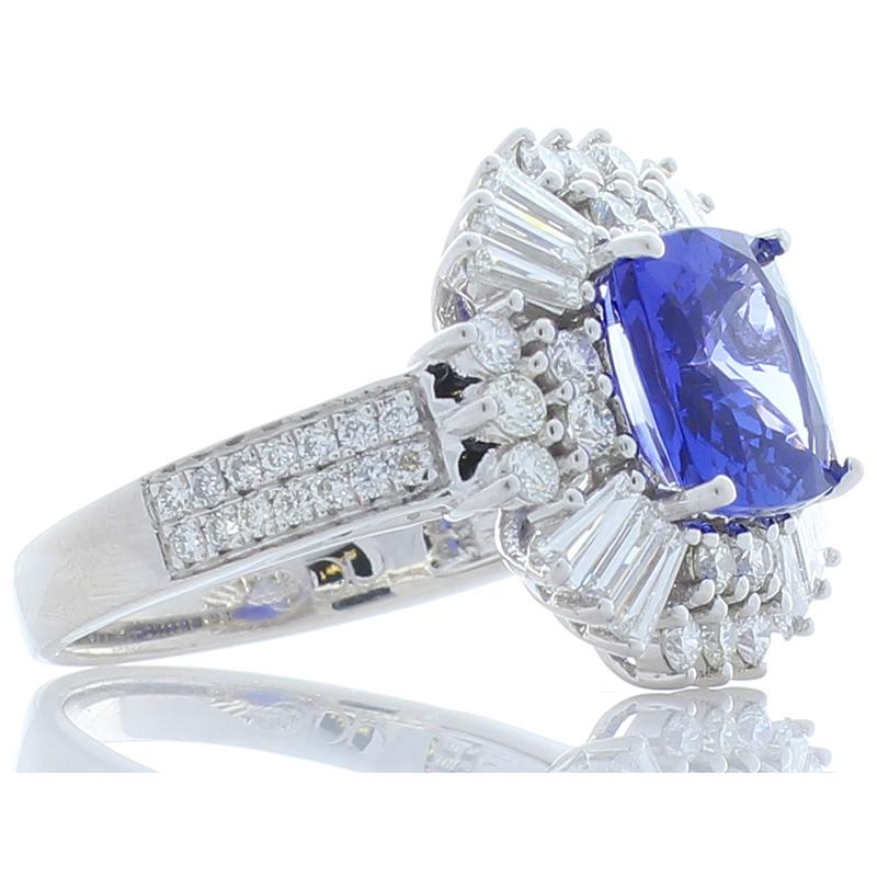 A 2.61 carat perfectly cut cushion brilliant tanzanite is sourced near the foothills of Mt. Kilimanjaro in Tanzania. It measures 8.50 x 8.53mm and is vivid bluish-violet. Its clarity and transparency is excellent. Most importantly, the cutter was