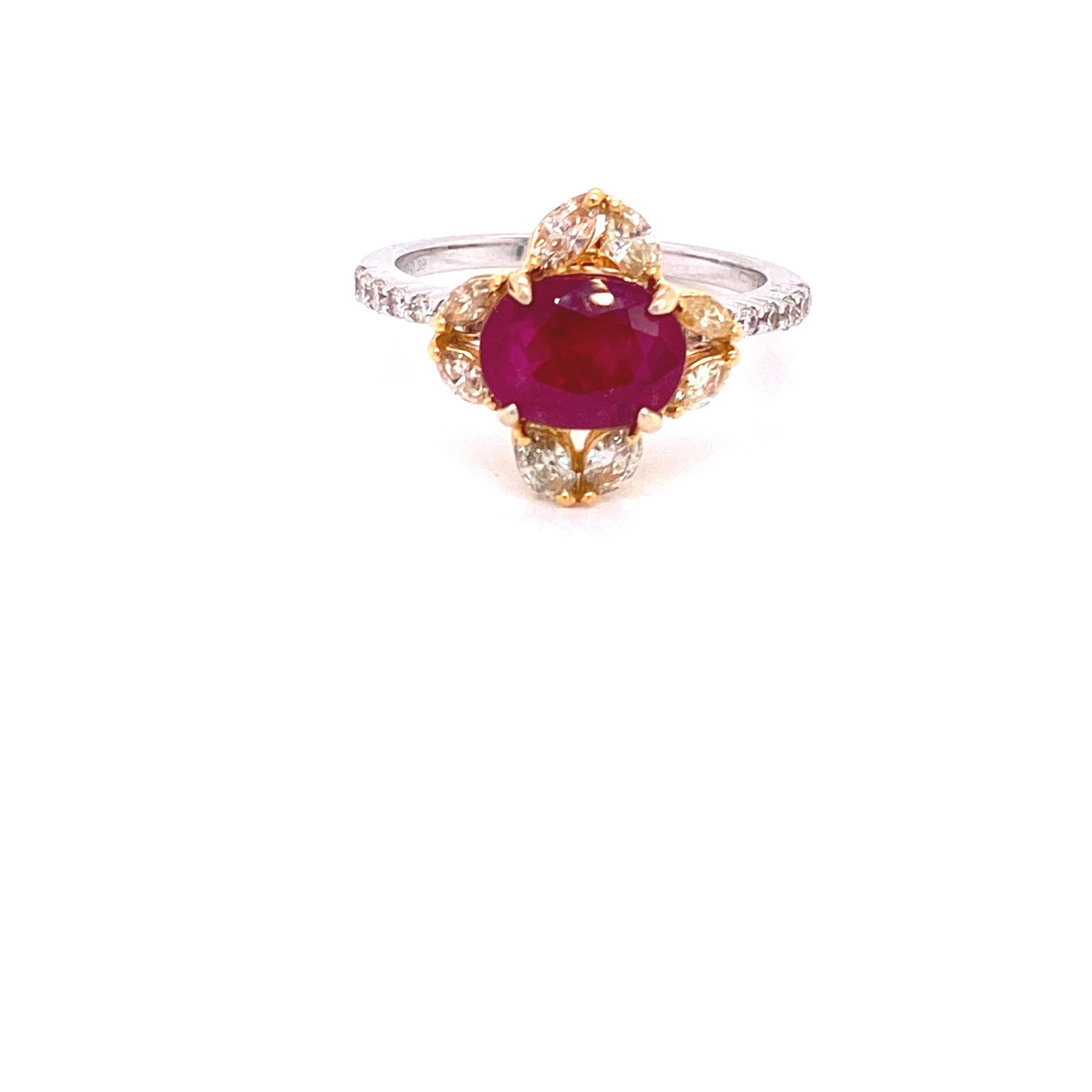 2.61 Carat GRS Certified Unheated Burmese Ruby and Diamond Gold Engagement Ring:

A beautiful ring, it features a gorgeous GRS certified oval-cut unheated Burmese ruby weighing 2.61 carat, surrounded by a flowery halo of fancy yellow marquise