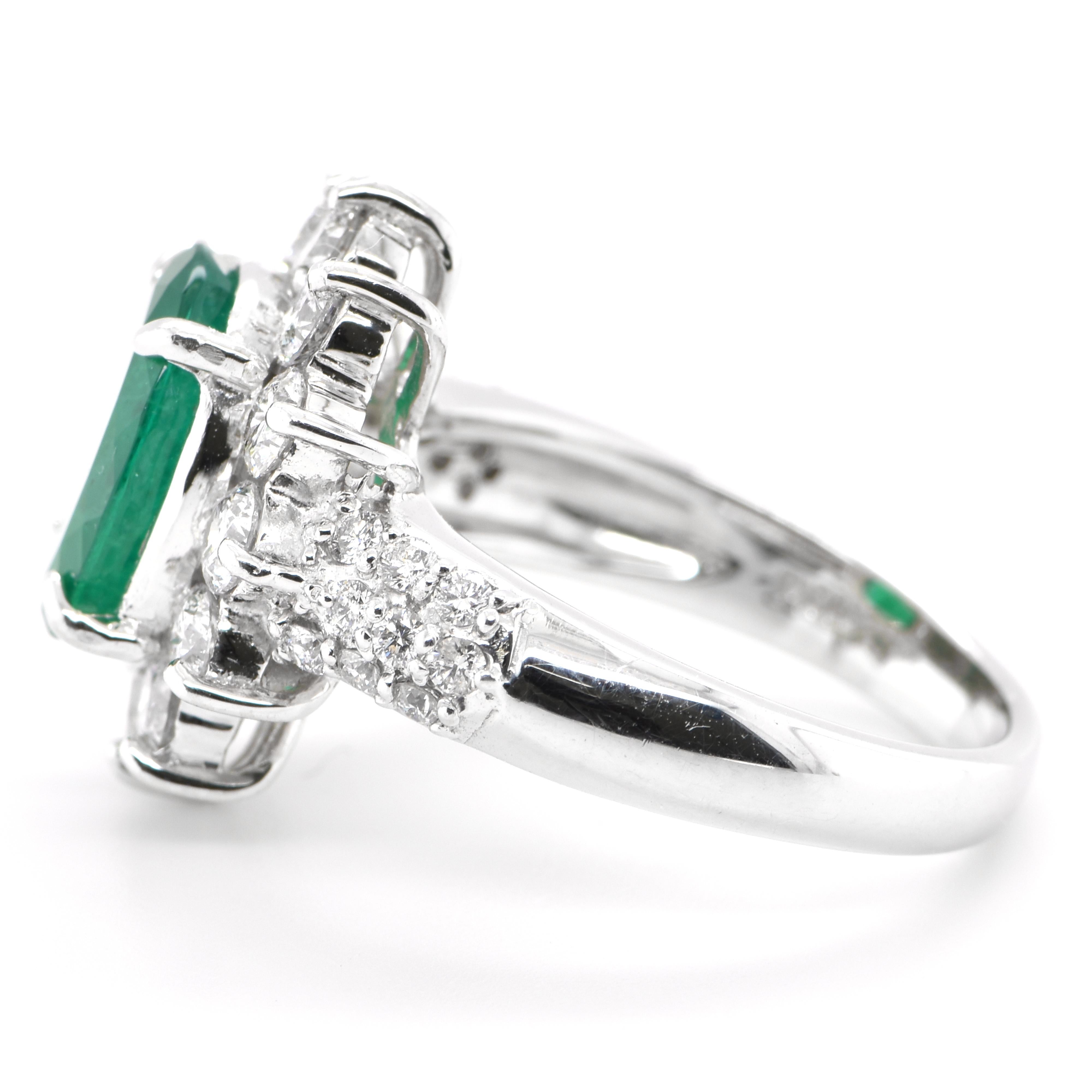 Oval Cut 2.61 Carat Natural Oval-Cut Emerald and Diamond Halo Ring Set in Platinum For Sale