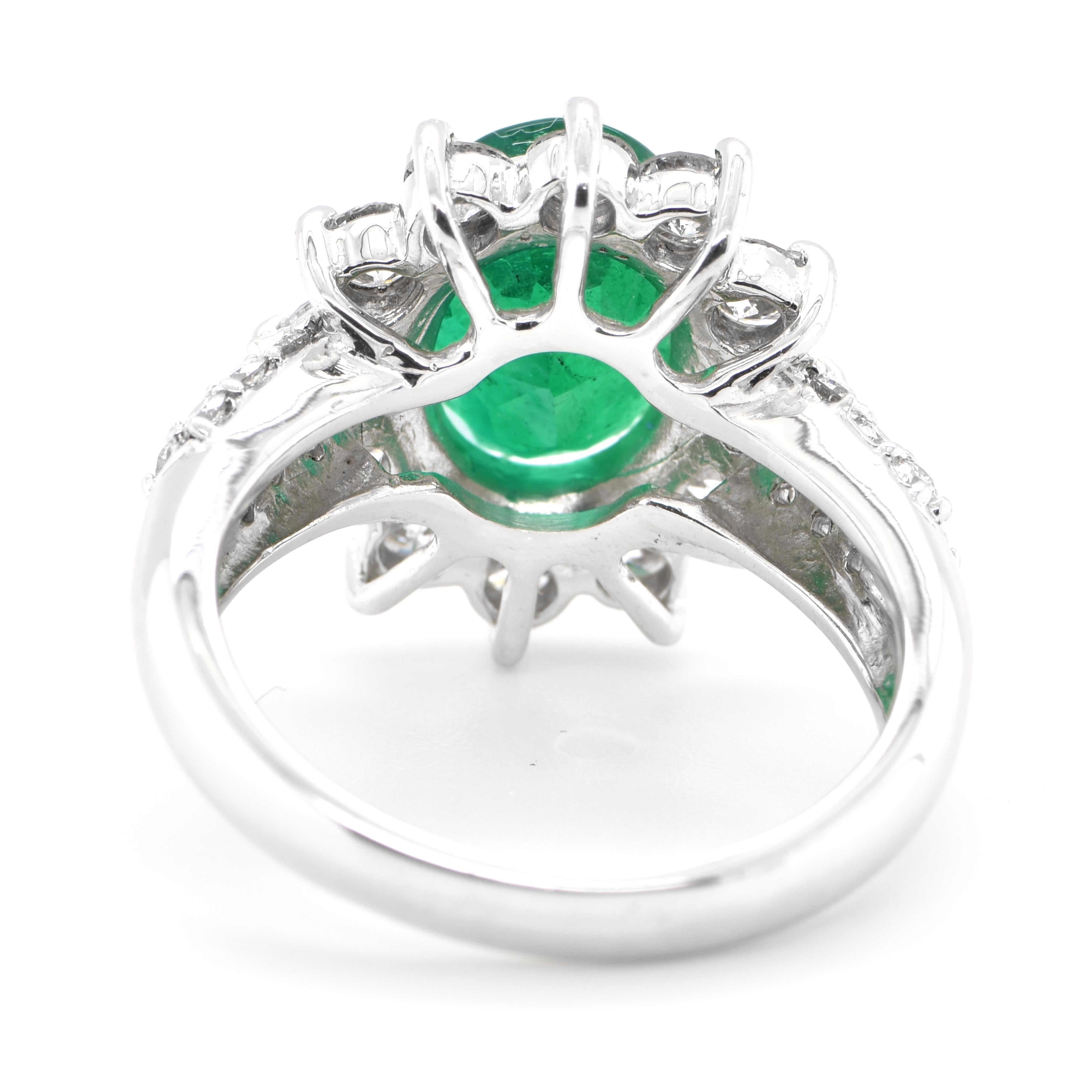 Women's 2.61 Carat Natural Oval-Cut Emerald and Diamond Halo Ring Set in Platinum For Sale