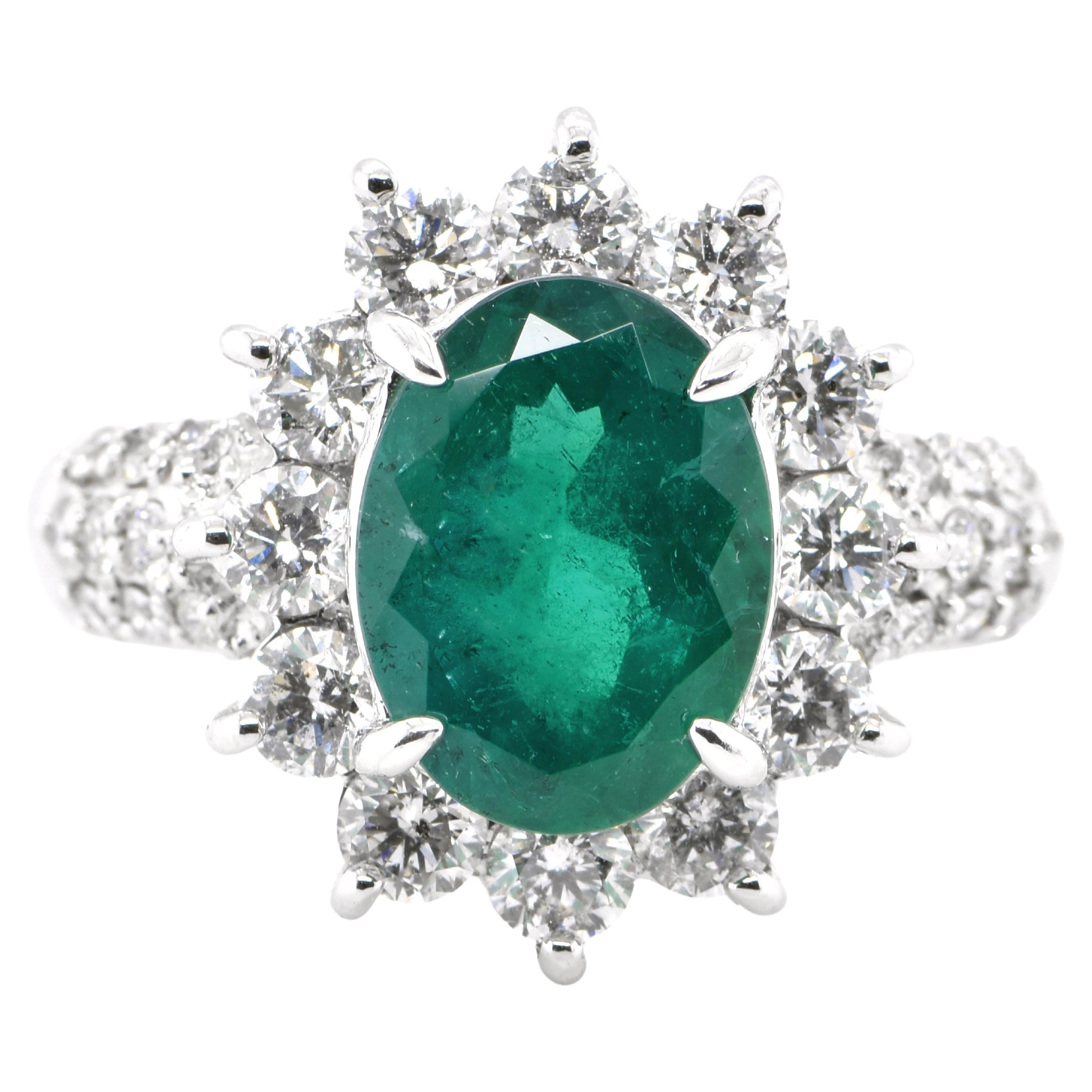 2.61 Carat Natural Oval-Cut Emerald and Diamond Halo Ring Set in Platinum For Sale