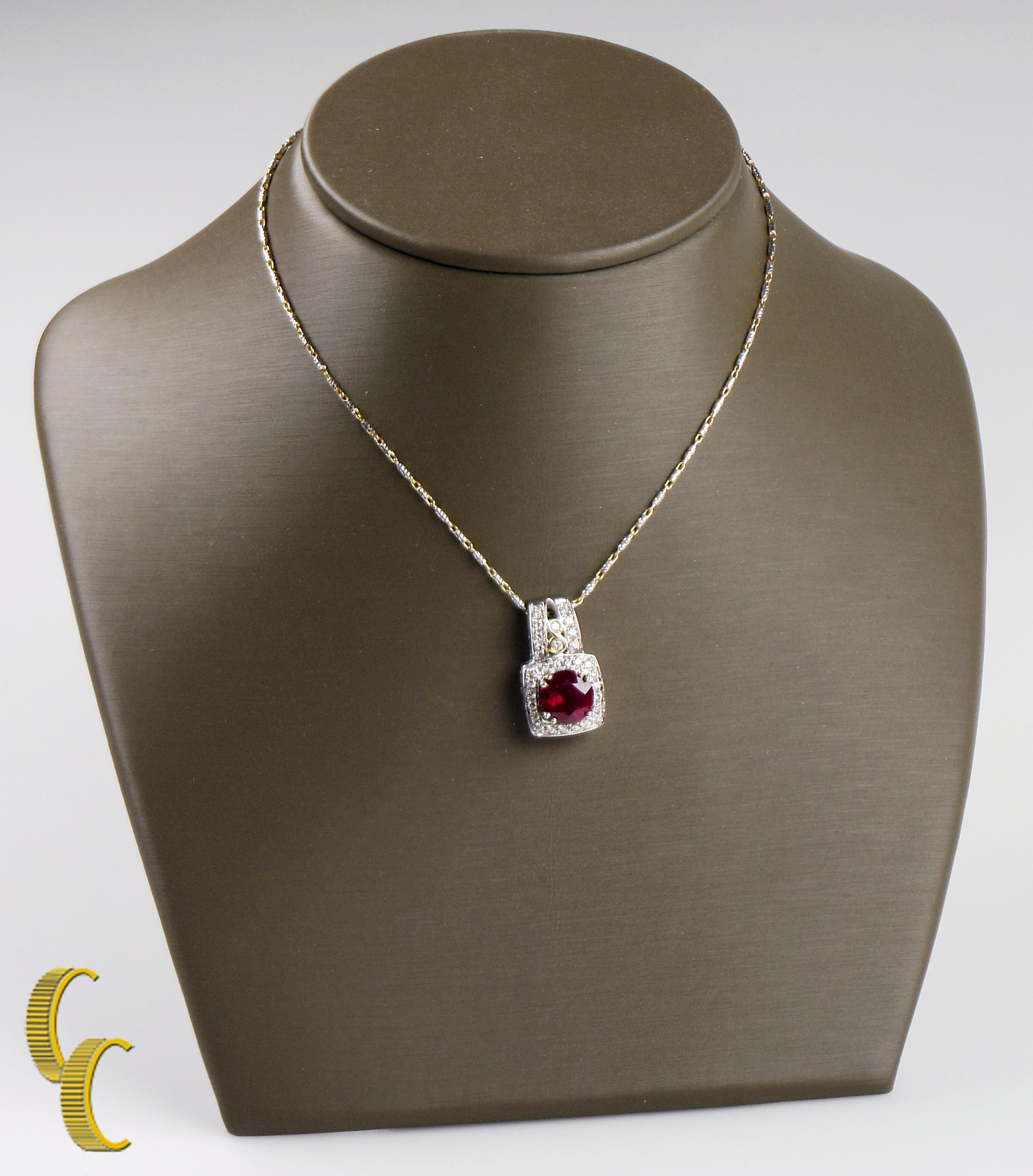 One electronically tested 14k white fold ladies cast & assembled ruby and diamond pendant with chain.
Condition is new , good workmanship.
The slide pendant features a ruby set within an elaborate diamond lattice gallery.
The pendant is supported by