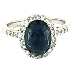 Bague halo en or blanc 14 carats avec saphir de 2,61 carats et diamants