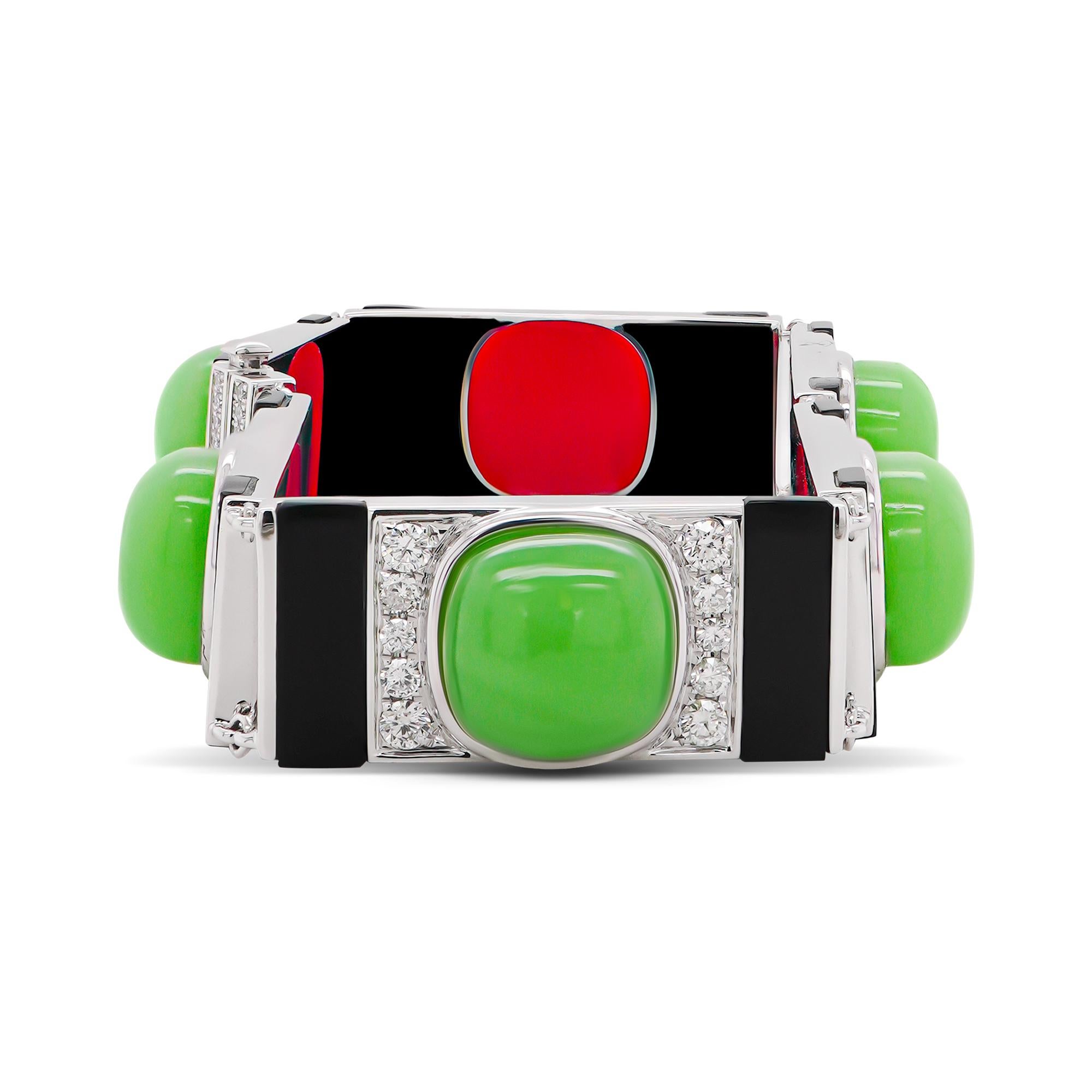 Exude timeless elegance with this extraordinary 26.14-carat Chrysoprase and Onyx Art Deco bracelet, a masterpiece of vintage-inspired design and modern craftsmanship. Set in luxurious 18K gold, this bracelet seamlessly combines bold geometric
