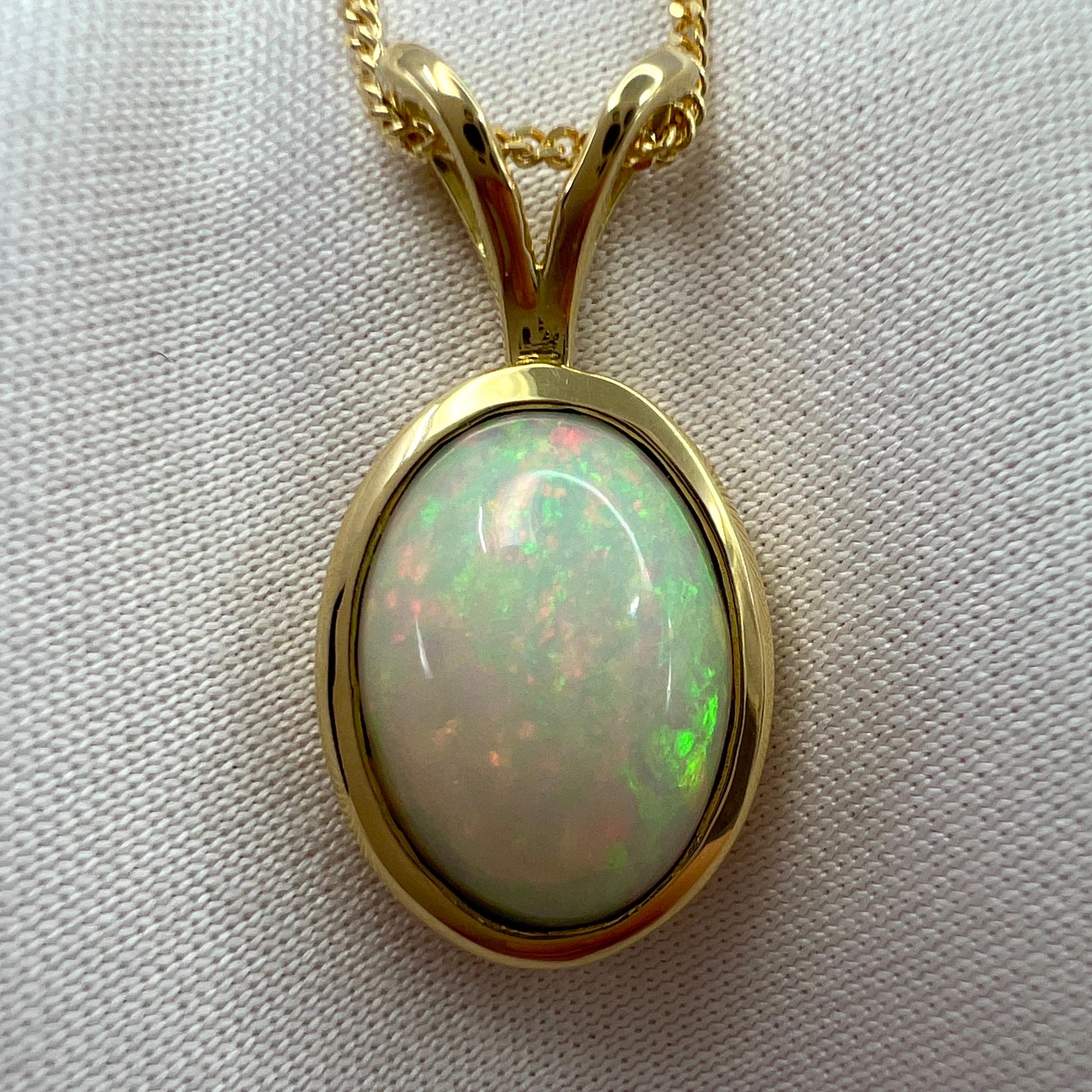 Fine White Opal 18 Karat Yellow Gold Pendant Necklace

2.61 Carat opal with beautiful play of colour and an excellent oval cabochon cut. Set in a fine 18k yellow gold rubover solitaire pendant. Stunning opal with an excellent polish and lots of