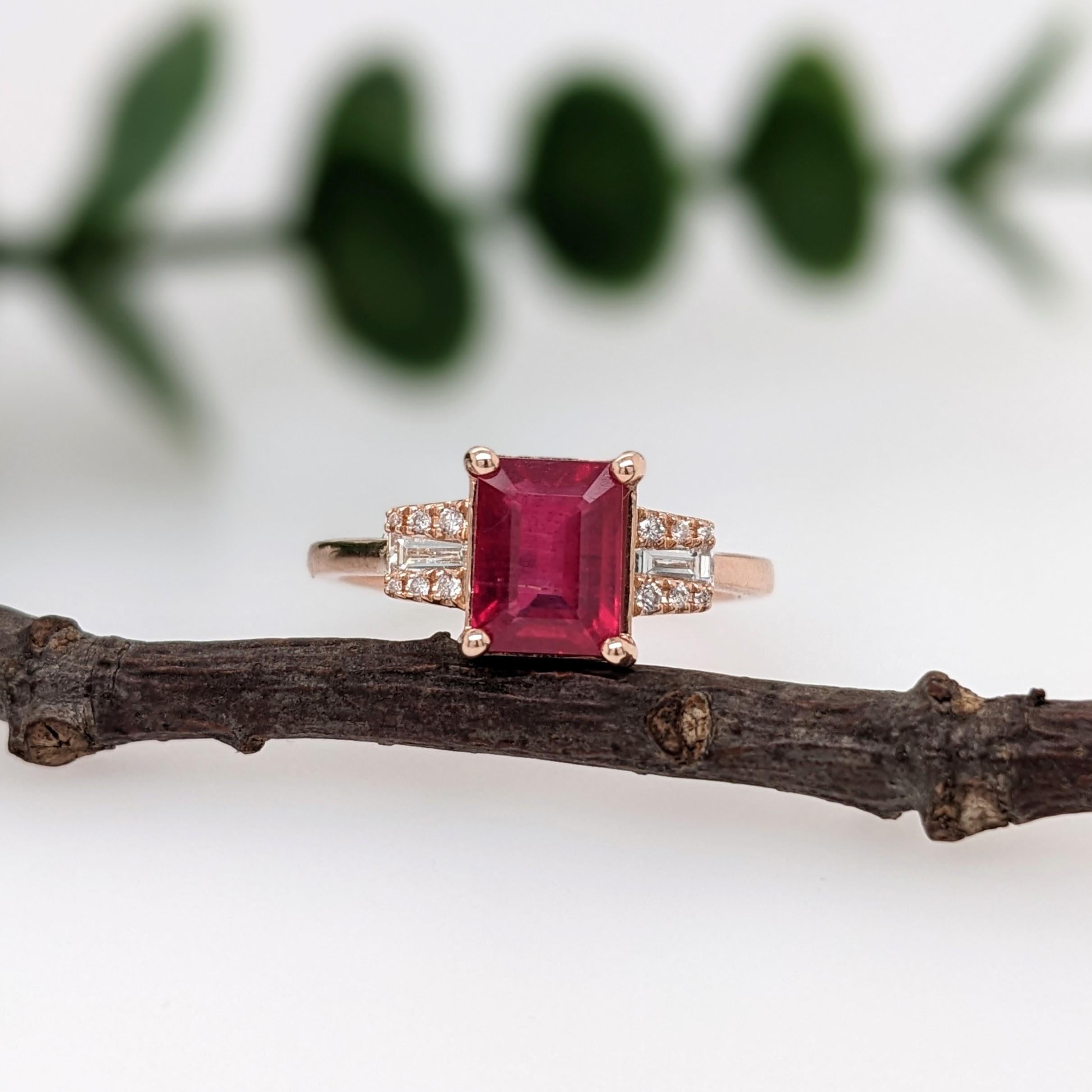 Enjoy this new ring design featuring a saturated pigeon blood red ruby in 14k rose gold with baguette and round diamond accents. A stunning ring perfect for an eye catching engagement or anniversary. This ring also makes a beautiful birthstone ring