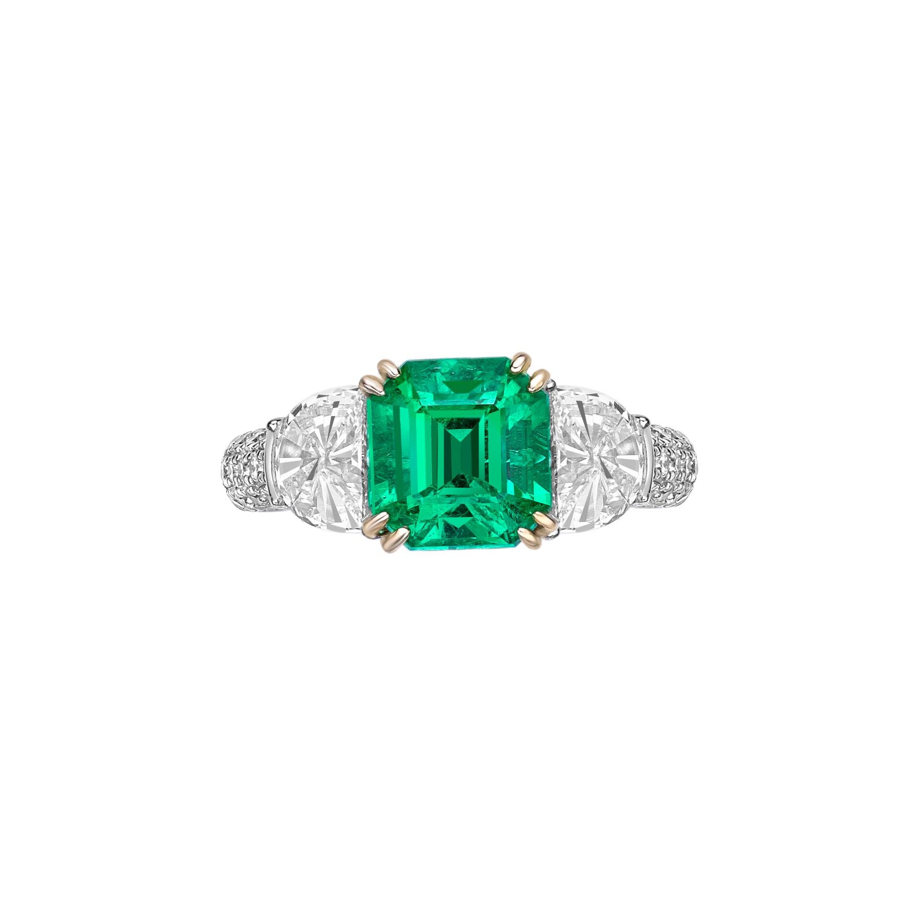 Contemporary 2.62 Carat Emerald Fancy Ring in 18Karat White Yellow Gold with White Diamond. For Sale