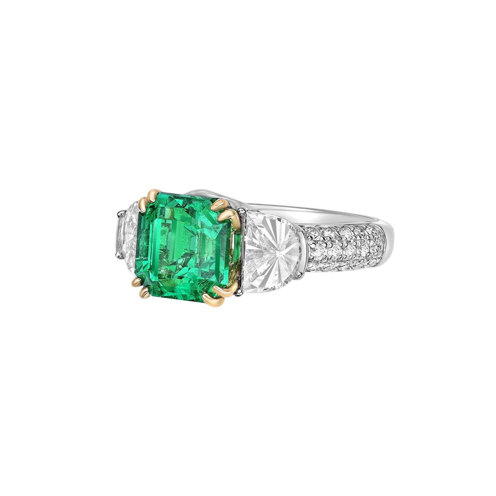 Octagon Cut 2.62 Carat Emerald Fancy Ring in 18Karat White Yellow Gold with White Diamond. For Sale
