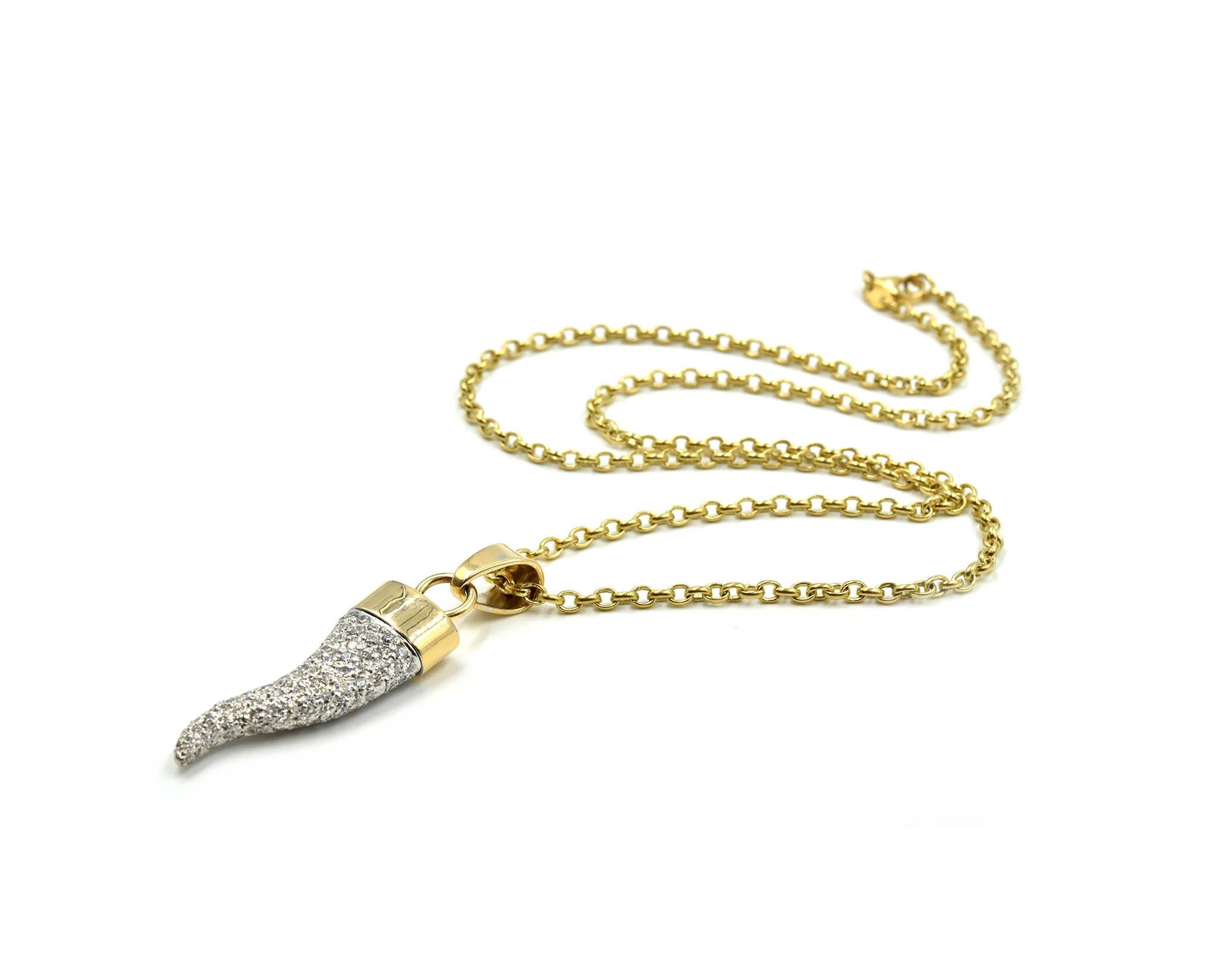 Designer: custom design
Material: 18k yellow gold
Diamonds: 175 round brilliant cuts = 2.62 carat total weight
Color: H-I
Clarity: VS
Dimensions: Italian horn pendant measures 1 1/2-inches long and a 1/2-inch wide, necklace measures 20-inches