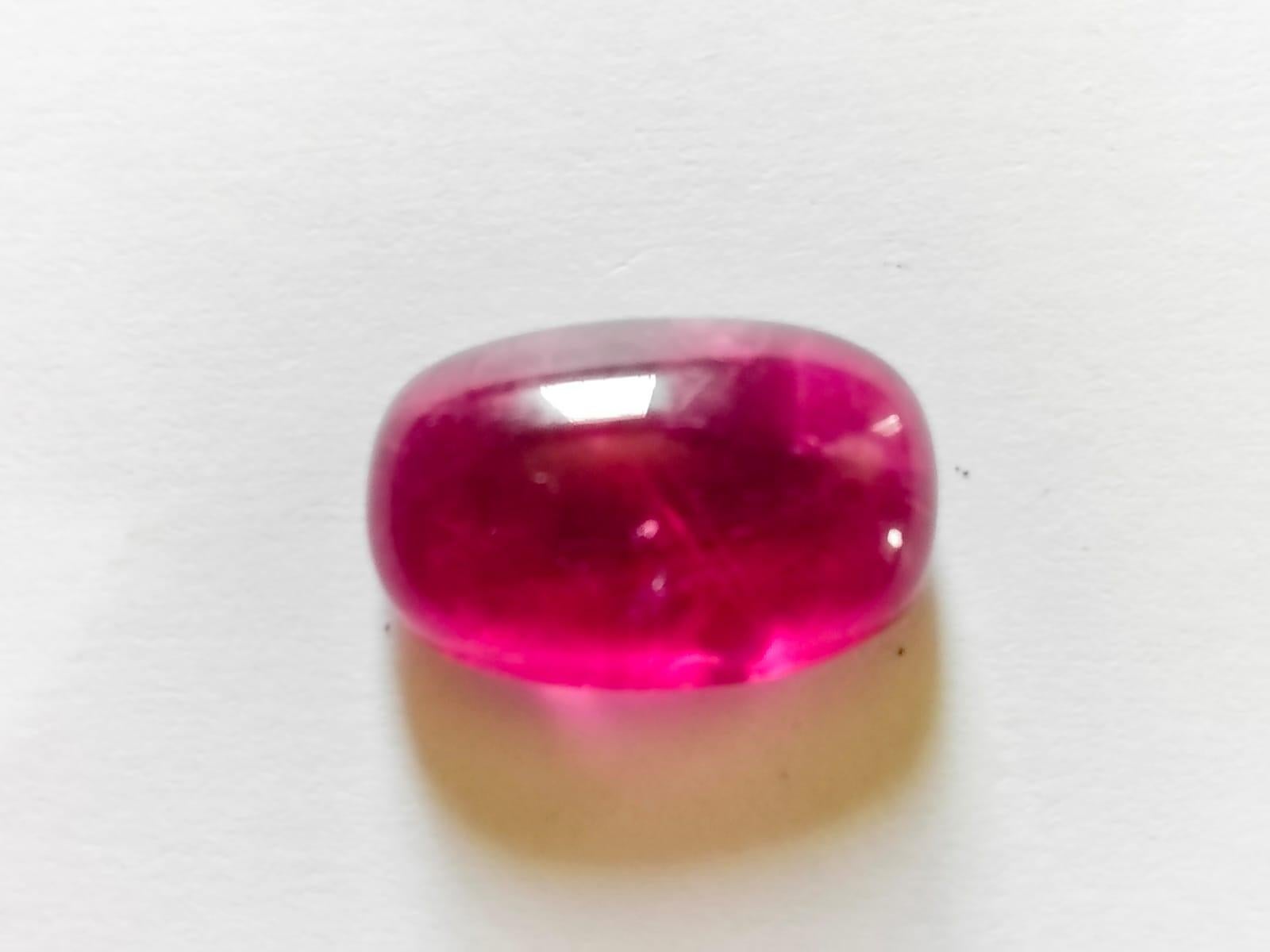 Natural Rubellite Cabochon Gemstone.
26.25 Carat with a elegant Red colour and excellent clarity. Also has an excellent fancy Cushion cut with ideal polish to show great shine and colour . It will look authentic in jewellery. The dimensions of the