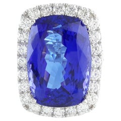 Anello con diamante aureolato di tanzanite da 26,25 carati