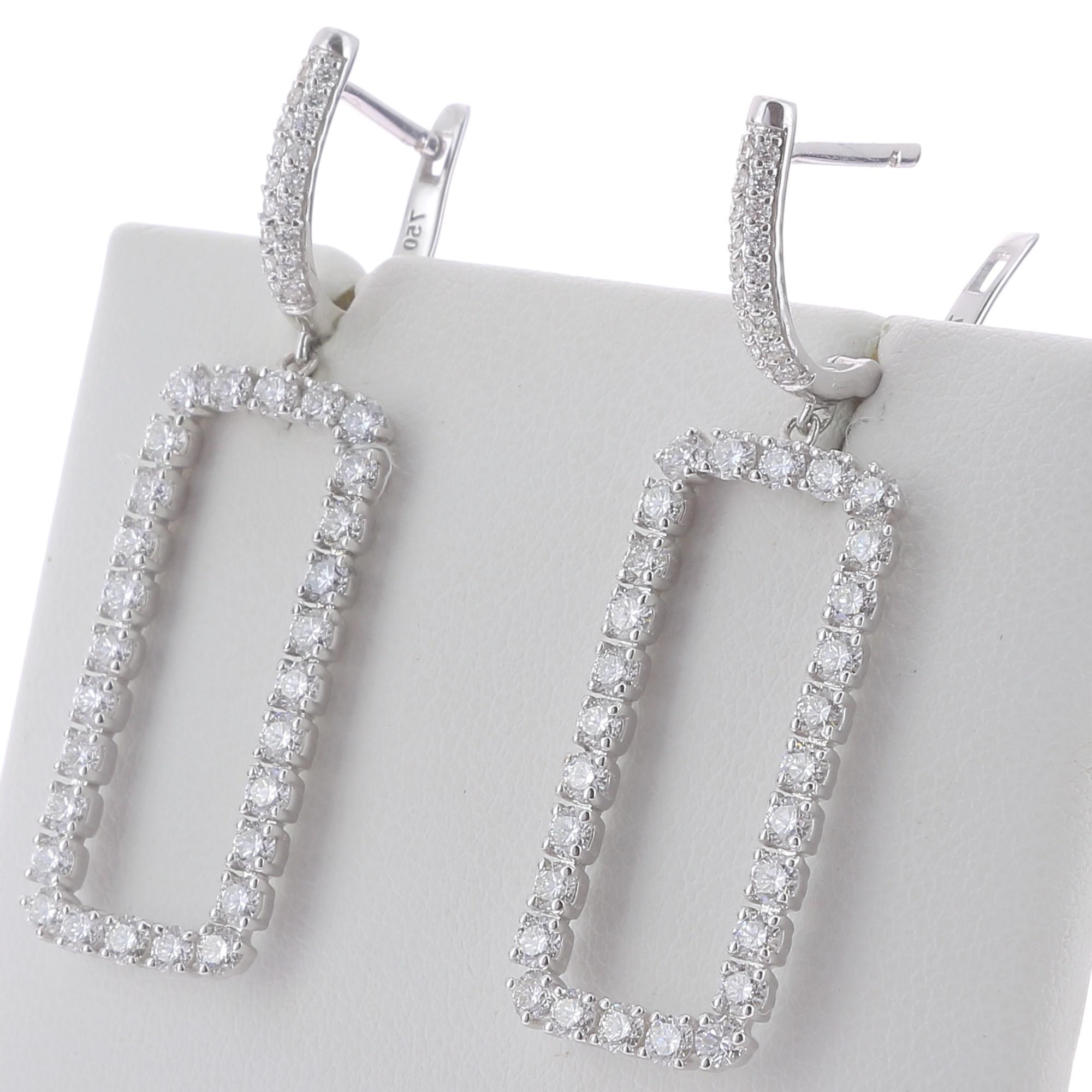 The Rectangle Diamonds Earrings are set with Round Diamonds weighing 2.63 Carat.
The Earrings are set with 56 Round Diamonds with a rectangle pattern weighing 2.42 Carats, and a halo of round diamond weighing 0.21 Carat
The Diamonds are GVS