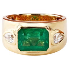 2.63 Carat Emerald and .50 Carat Diamond Dome Ring