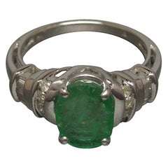 2.63 Carat Oval Emerald and Diamond 10 Karat White Gold Ring