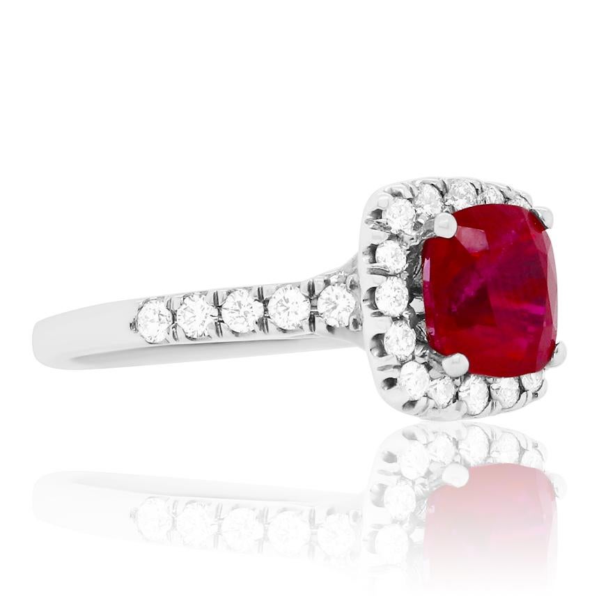 Material: 14K White Gold
Gemstone Details: 1 Cushion Ruby at 2.63 Carats 
Diamond Details: 26 Brilliant Round White Diamonds at 0.55 Carats. SI Clarity / H-I Color. 
Ring Size: 6.5. Alberto offers complimentary sizing on all rings.

Fine one-of-a
