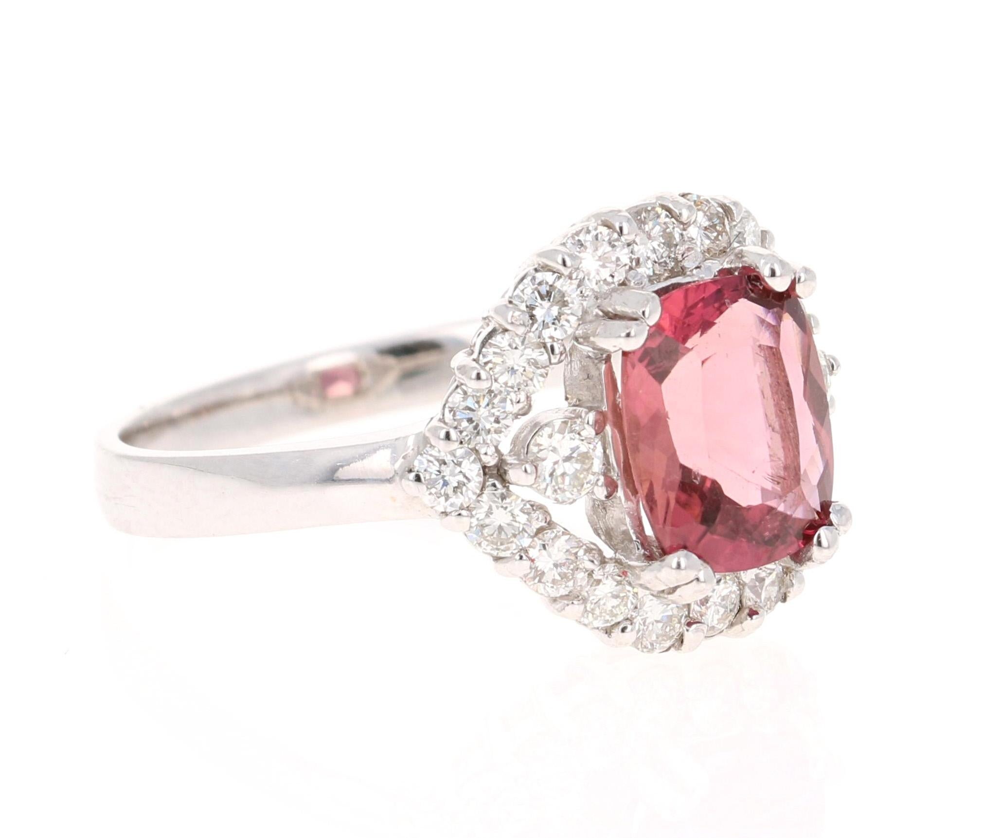 The most beautiful Tourmaline Ring with a delicate design yet a bold color! 

This ring has a Cushion cut 1.87 Carat Tourmaline and is surrounded by 22 Round Cut Diamonds that weigh 0.76 Carats. The total carat weight of the ring is 2.63 Carats.