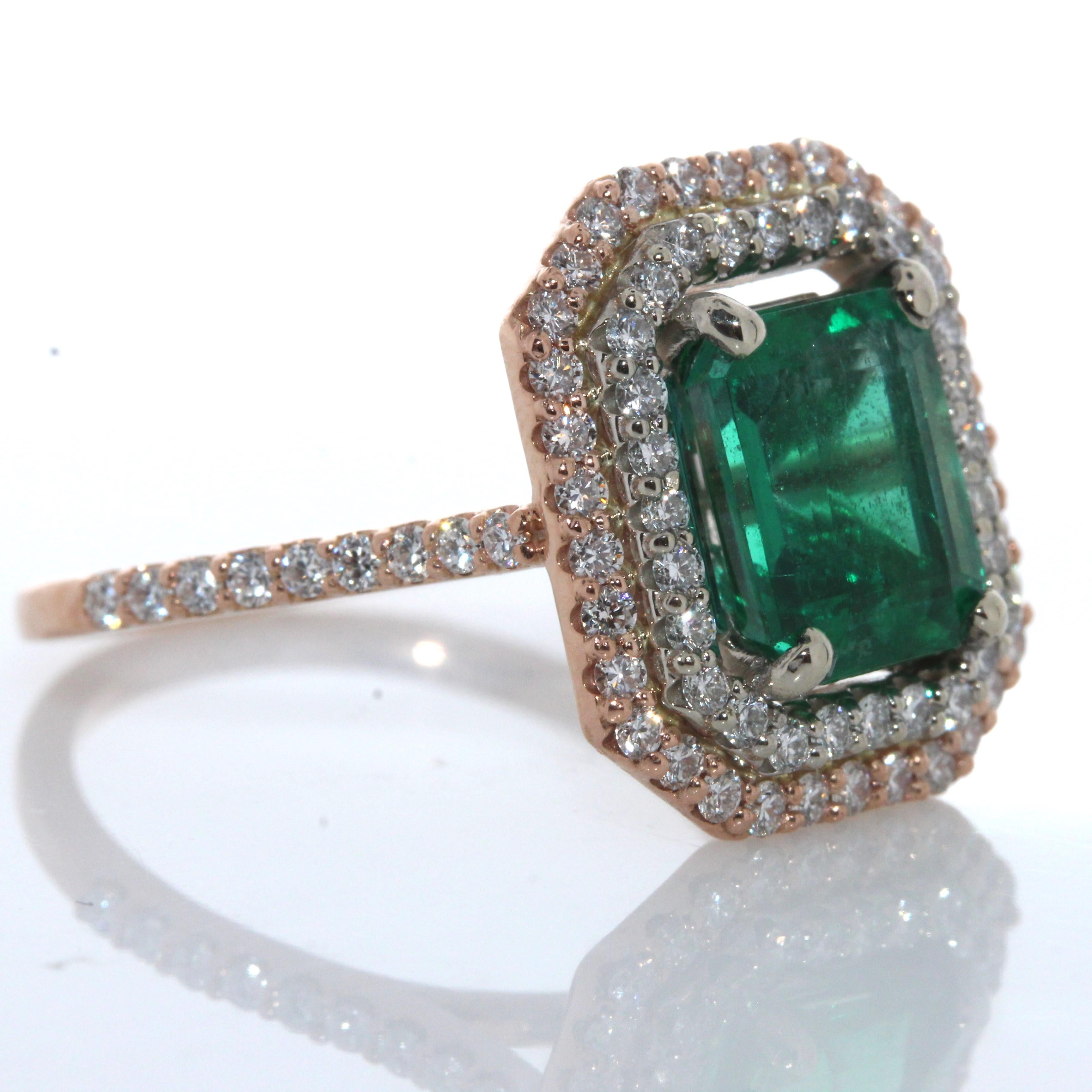 This ring features a spectacular 2.63 carats emerald cut emerald. Would you look at this beauty! Simple in design, but there is nothing ordinary about the gorgeous color of this breathtaking green emerald ring. The 1.20 carat total weight of 80