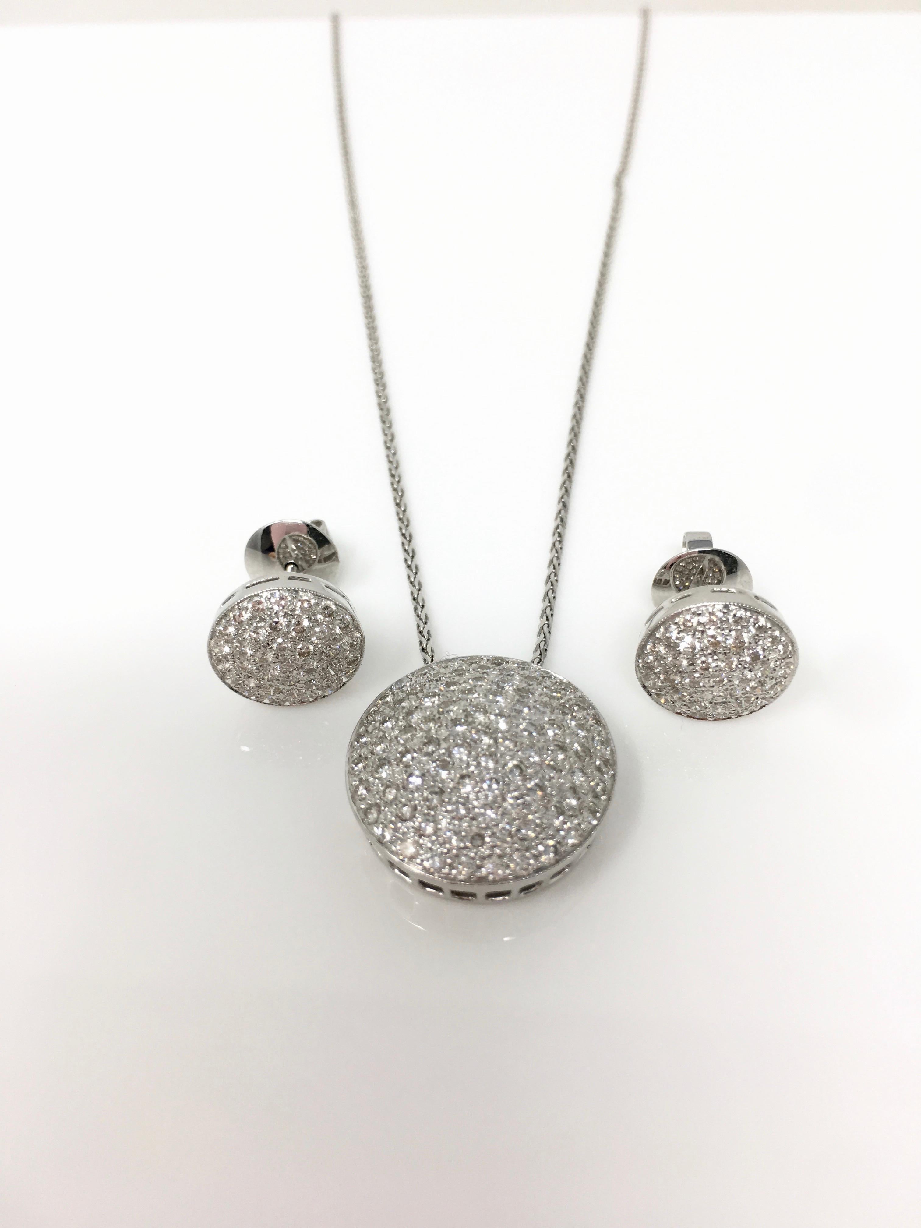 This gorgeous and elegant creation by Moguldiam Inc features custom handmade pair of earrings and a beautiful pendant necklace. The diamond weight of this three piece pendant set is 2.63 carat ( Pendant - 1.50 carat and earring studs - 1.13 carat)