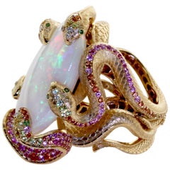 26.33 Carat Opal, 18 Karat Yellow Gold Snake Ring