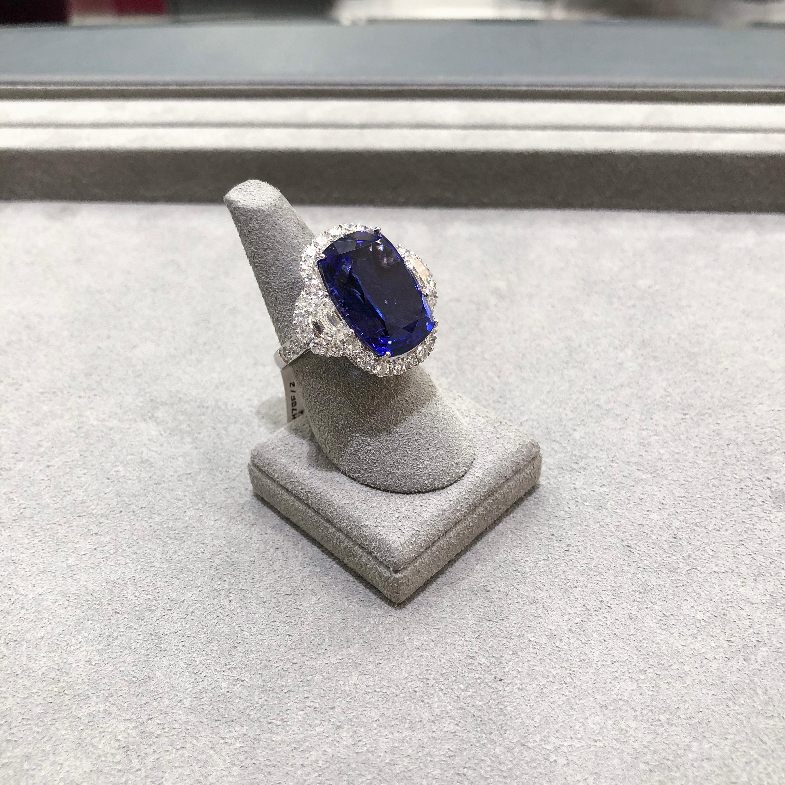 Contemporary Roman Malakov 26.35 Carat Tanzanite and Diamond Three-Stone Halo Cocktail Ring For Sale