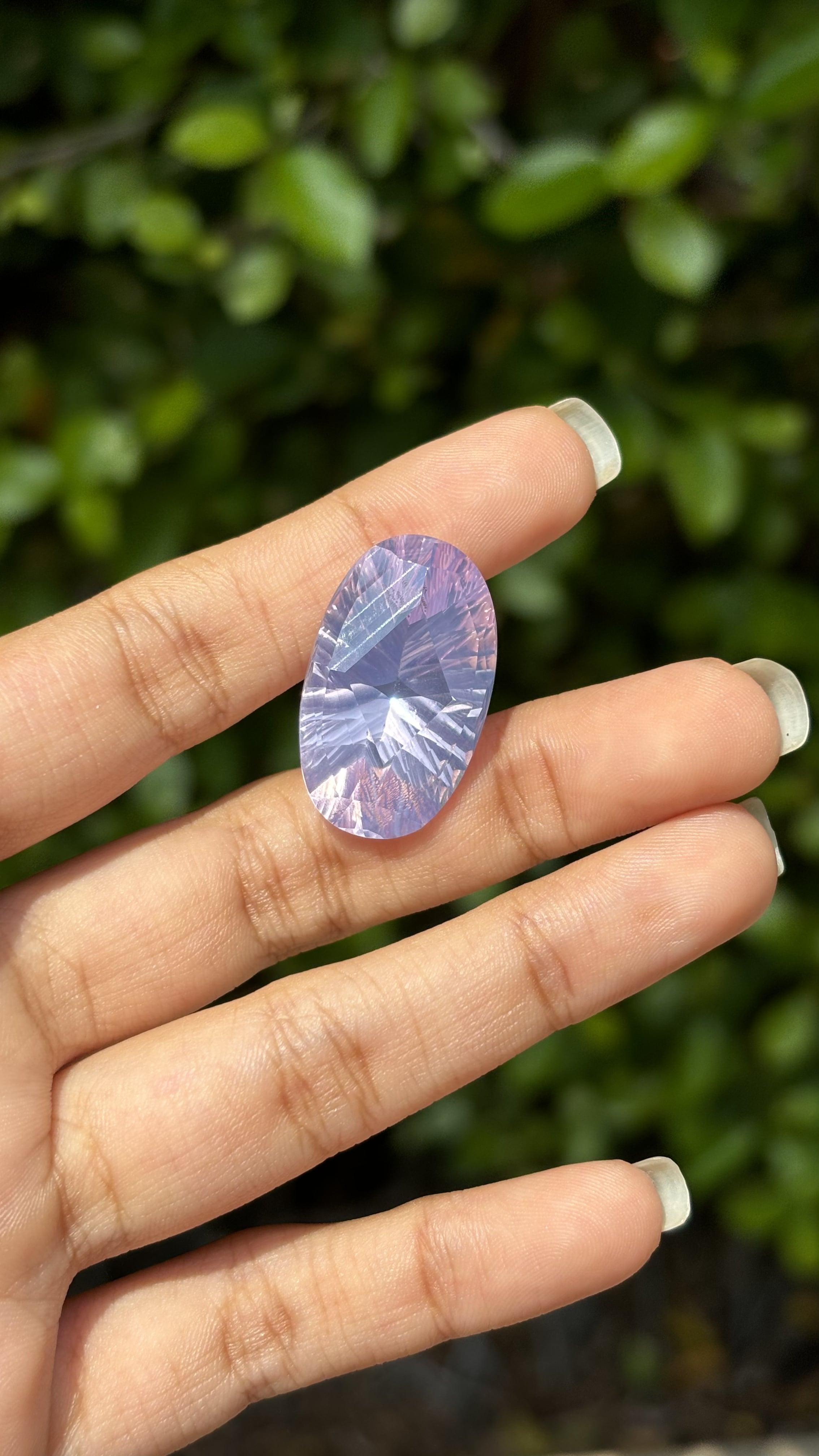 A mesmerising 26.38 Carat Amethyst gemstone. It is completely natural and it is a clean stone.  The amethyst has a unique and breath-taking pastel purple color that is sure to allure you at first sight! The amethyst is cut to perfection in a