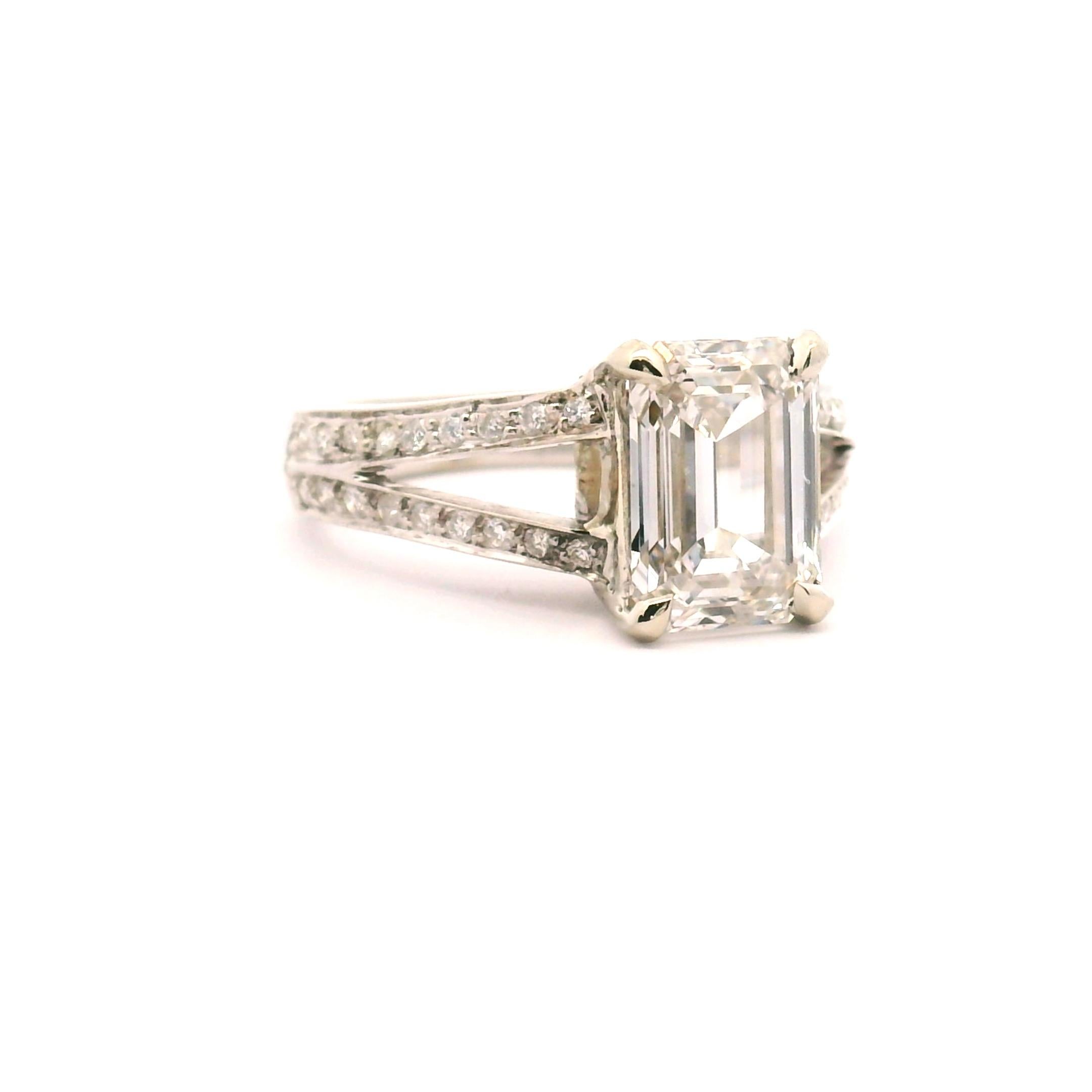 Lady's 18k white gold engagement ring split arch design with diamonds going down the arch's
Center diamond 2.63ct.

Clarity grade is VS1
Color grade is G
GIA cert#7361880444 (HPHT)

36-.01ct. round brilliant cut diamonds 

18K gold weight 5.8 grams 