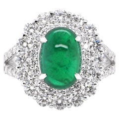 2.64 Carat Natural Emerald Cabochon and Diamond Cocktail Ring Set in Platinum