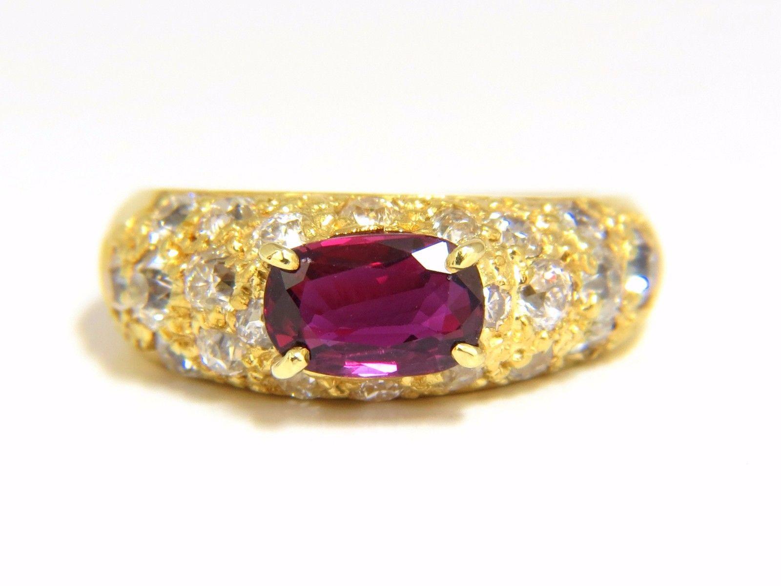 1.14ct. Natural Ruby Ring

8.9 X 5.0mm

Full cut oval brilliant 

Clean Clarity & Transparent

Vivid Purple Red



1.50ct. round Shaped diamonds.

H-color Si-2

  18kt. yellow gold

4.8 grams

Ring Current size: 5.5

Ring is 7.3mm wide

Depth