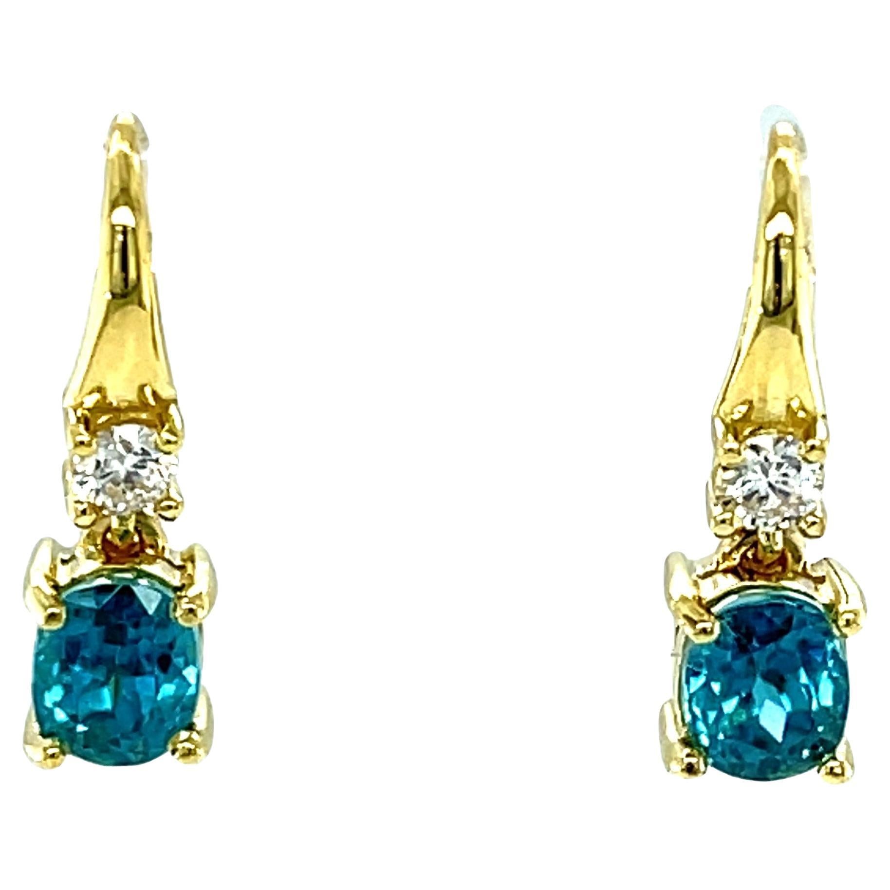 2.64 Carat Total Oval Blue Zircon and Diamond Yellow Gold Dangle Drop Earrings 
