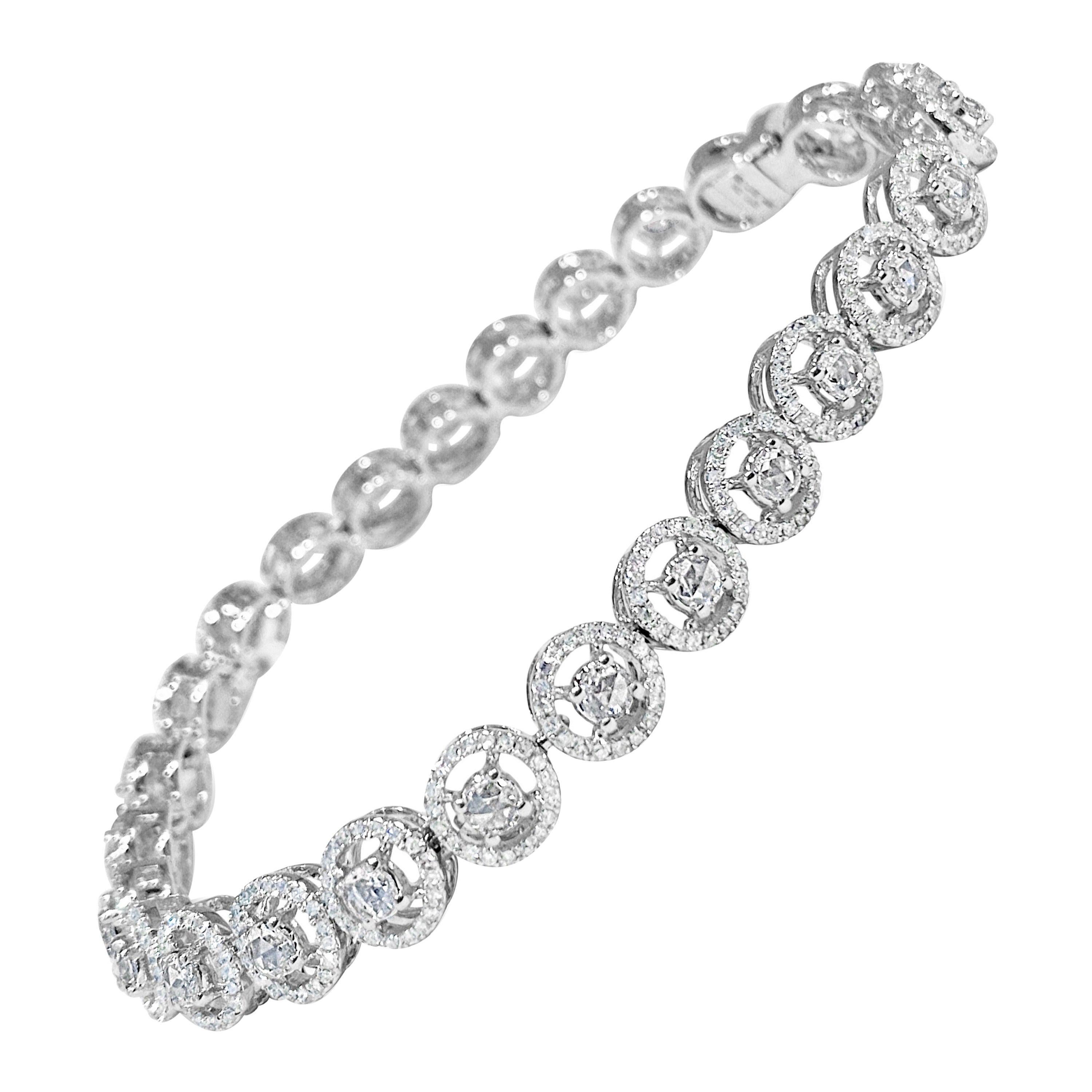 The Gina Bracelet 
Sophisticated and elegant, the Gina features a combination of rose cut diamonds and round brilliant diamonds, emitting a lasting glow of subtle brilliance.

Rose Cut Diamonds
Shape Round rose cut 
Color F
Clarity VS1
Weight 1.65