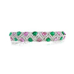 2.64 cts of Emerald and 3.71 cts of Pink Sapphire Bangle
