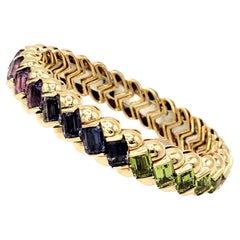26.42 Carats Multi-Colored Gemstone Rainbow Bangle Bracelet 18 Karat Yellow Gold