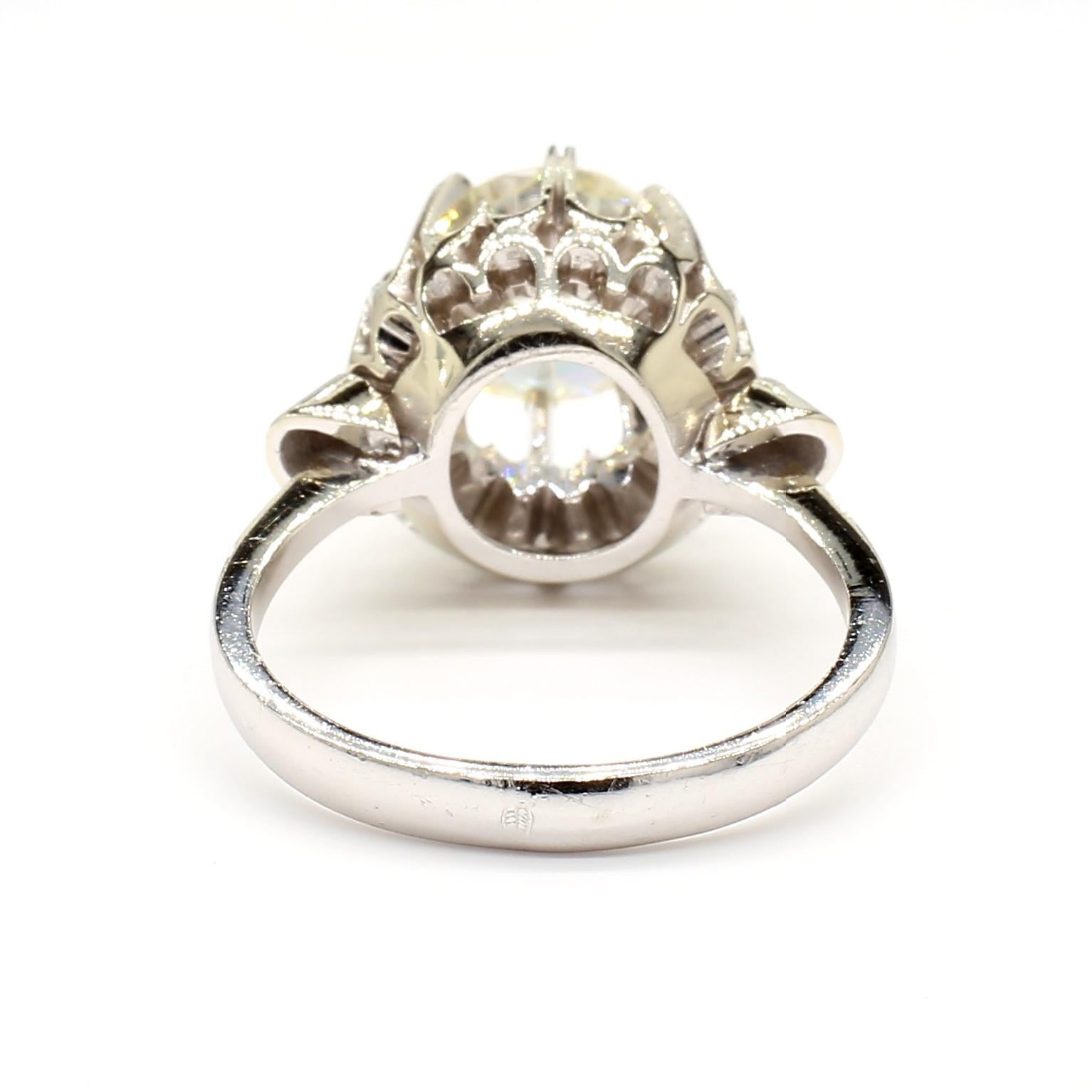 Experience the timeless elegance of our Art Deco Diamond Ring, featuring a breathtaking 2.65-carat Old European cut diamond. Known for its classic white hue and exceptional brilliance, this diamond is VVS2 clarity, ensuring a mesmerizing sparkle