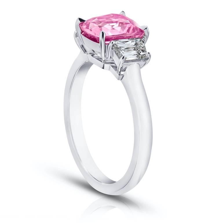 2.65 carat Cushion Pink Sapphire with trapezoid diamonds .64 carats set in a platinum ring
