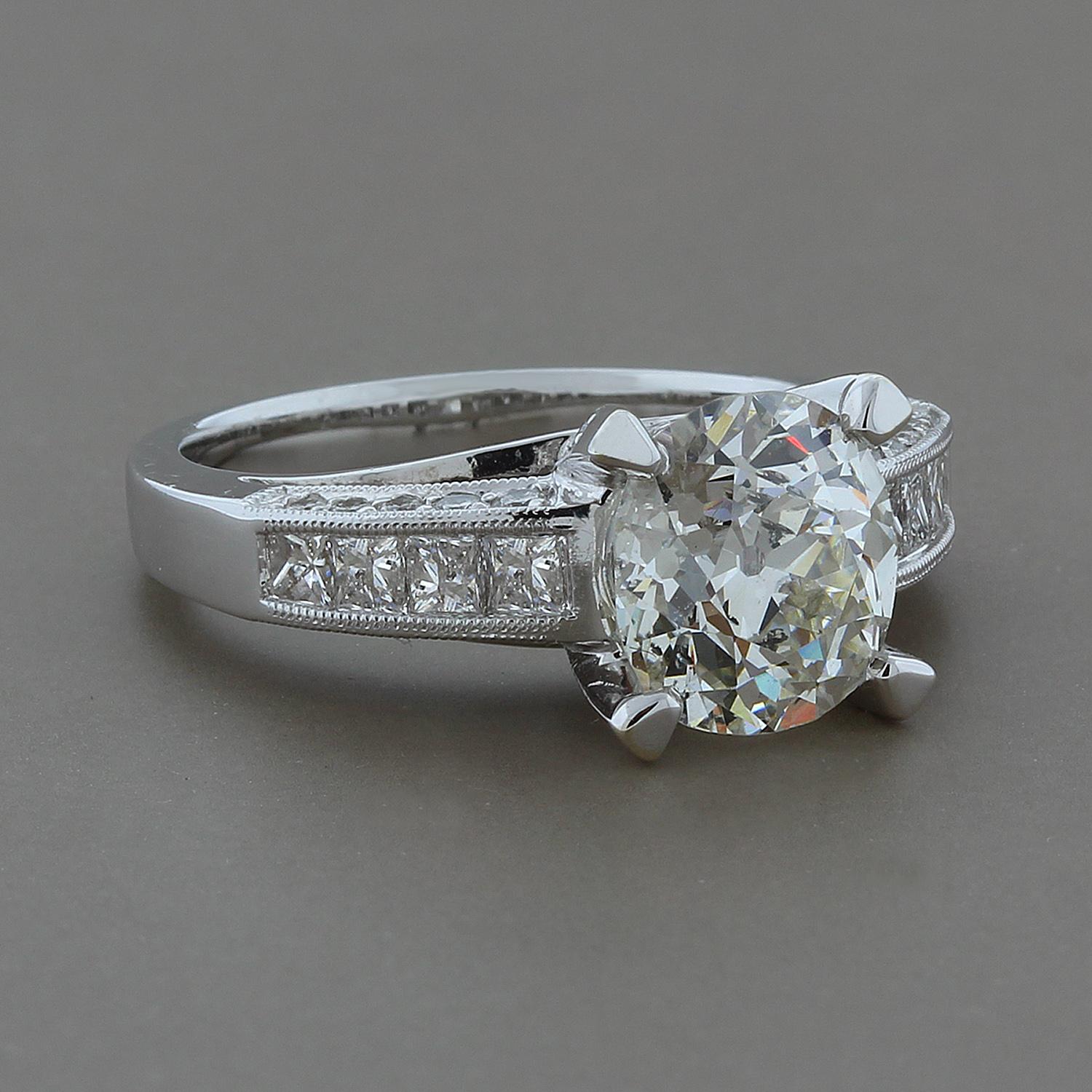 A beautiful diamond engagement ring that has features of old and new. The 2.65 carat diamond is a round European cut from the 1930's. It is mounted in a new 18K white gold ring to give it a more modern look. Get the best of both worlds - a classic