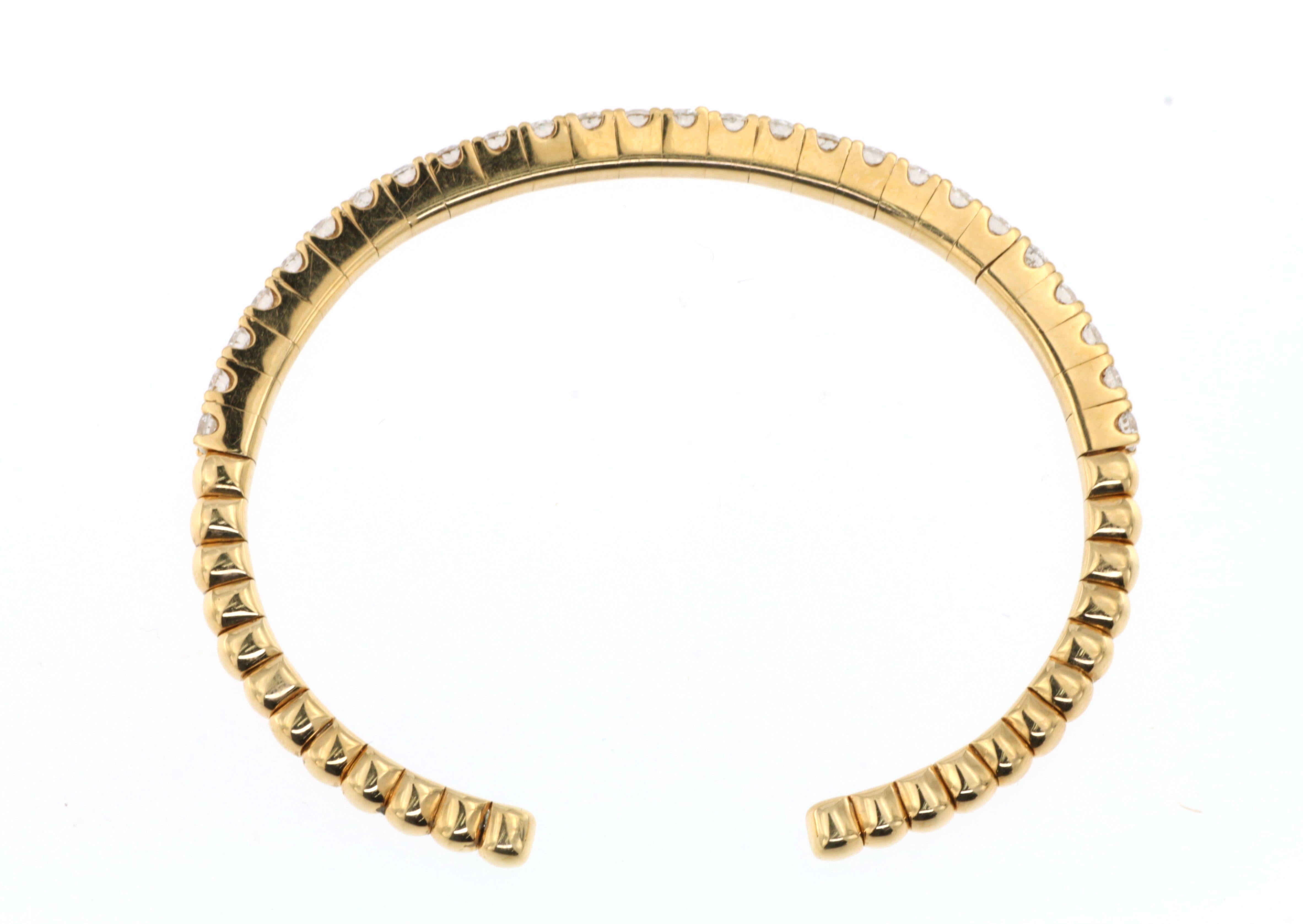 26 round brilliant cut diamonds are beautifully crafted in 18k yellow gold. Each diamond weights about 10 points/0.10 carat. Can stack with any other bracelet bangle of your choice to create a bolder look. Bracelet is a little bit flexible. Inner