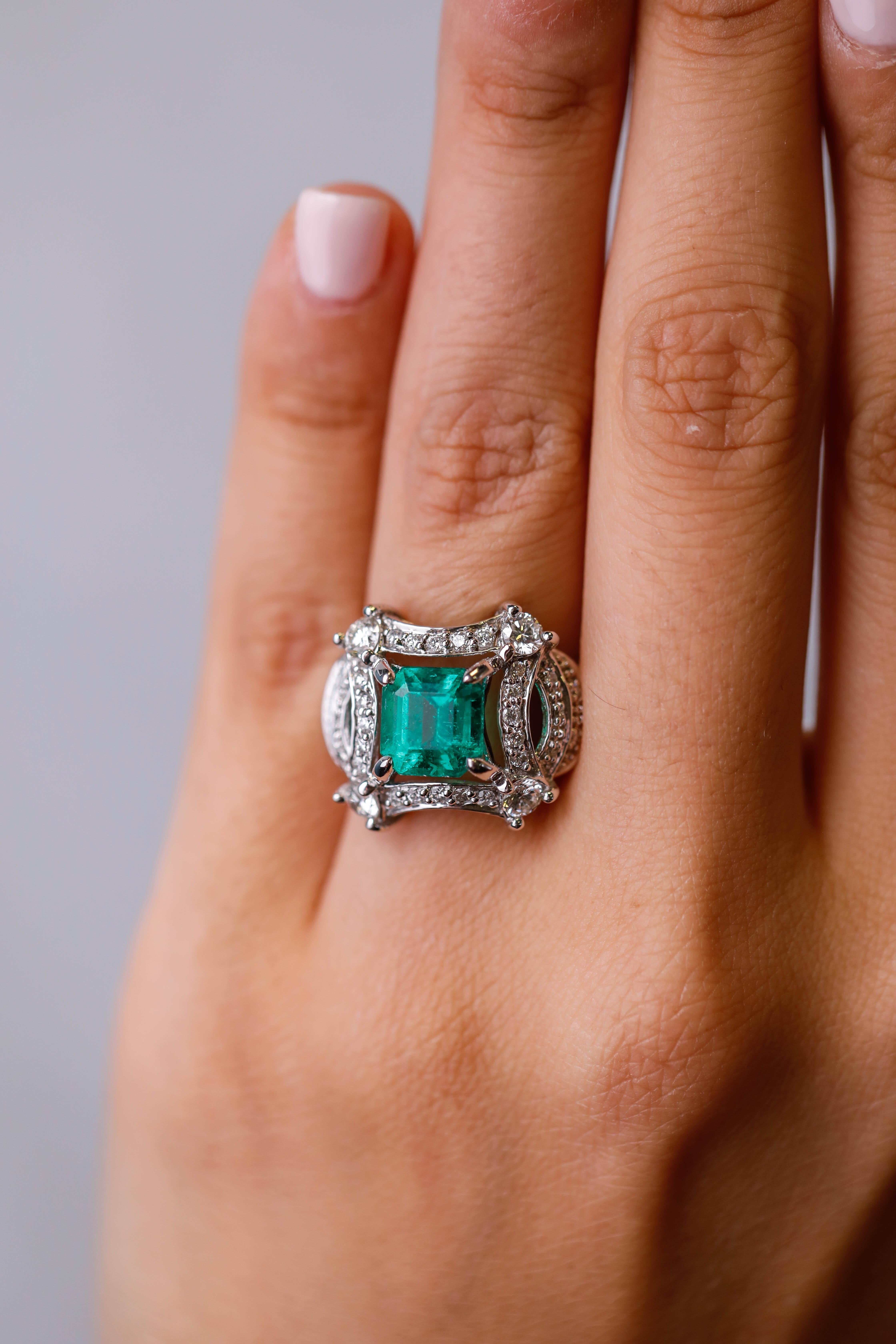 radiant cut emerald ring
