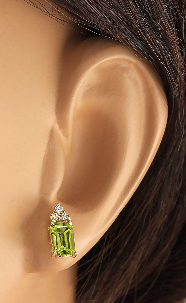 Emerald Cut Peridot Diamond Earrings In 14 Karat Yellow Gold For Sale