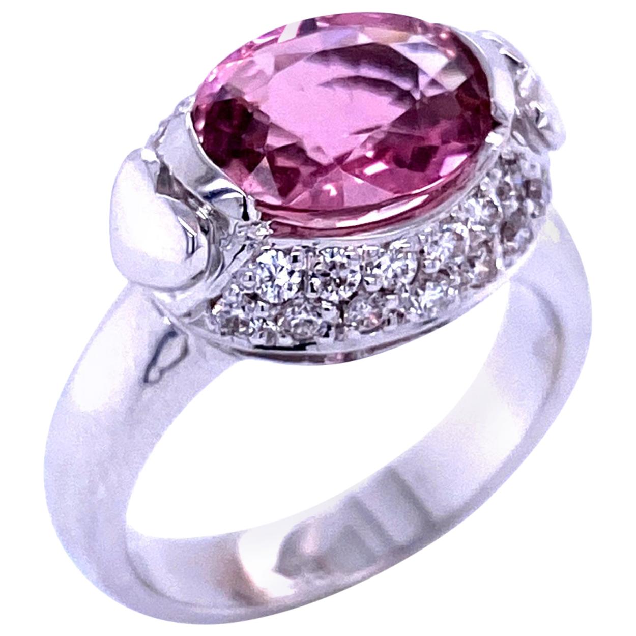 2.65 Carat Oval Pink Tourmaline Pave Set 0.49 Carat Diamond Engagement Ring For Sale