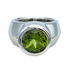 2.65 Carat Round Cut Bezel Set Peridot Wide Band Ring in 14 Karat White Gold