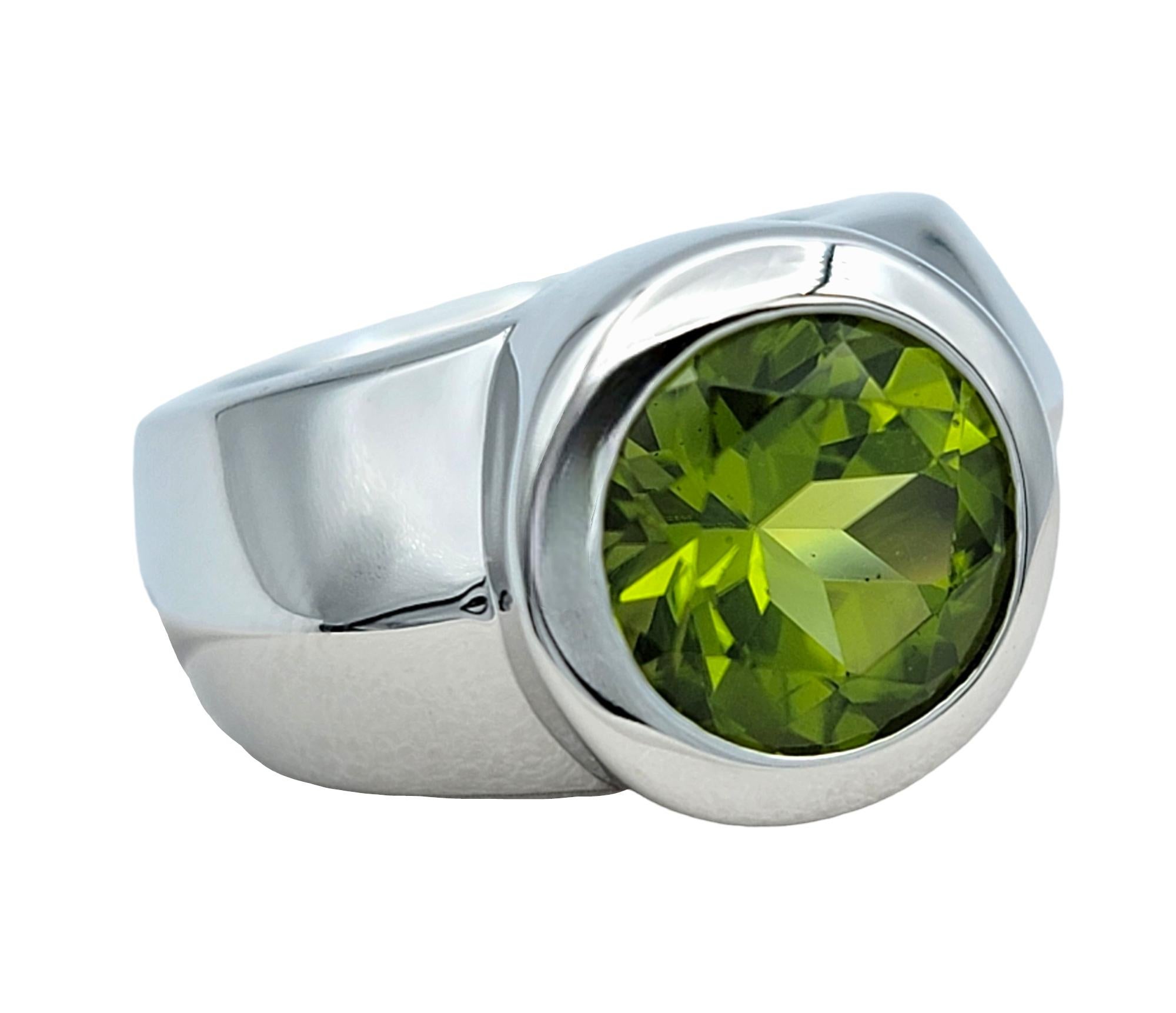 Women's 2.65 Carat Round Cut Bezel Set Peridot Wide Band Ring in 14 Karat White Gold For Sale