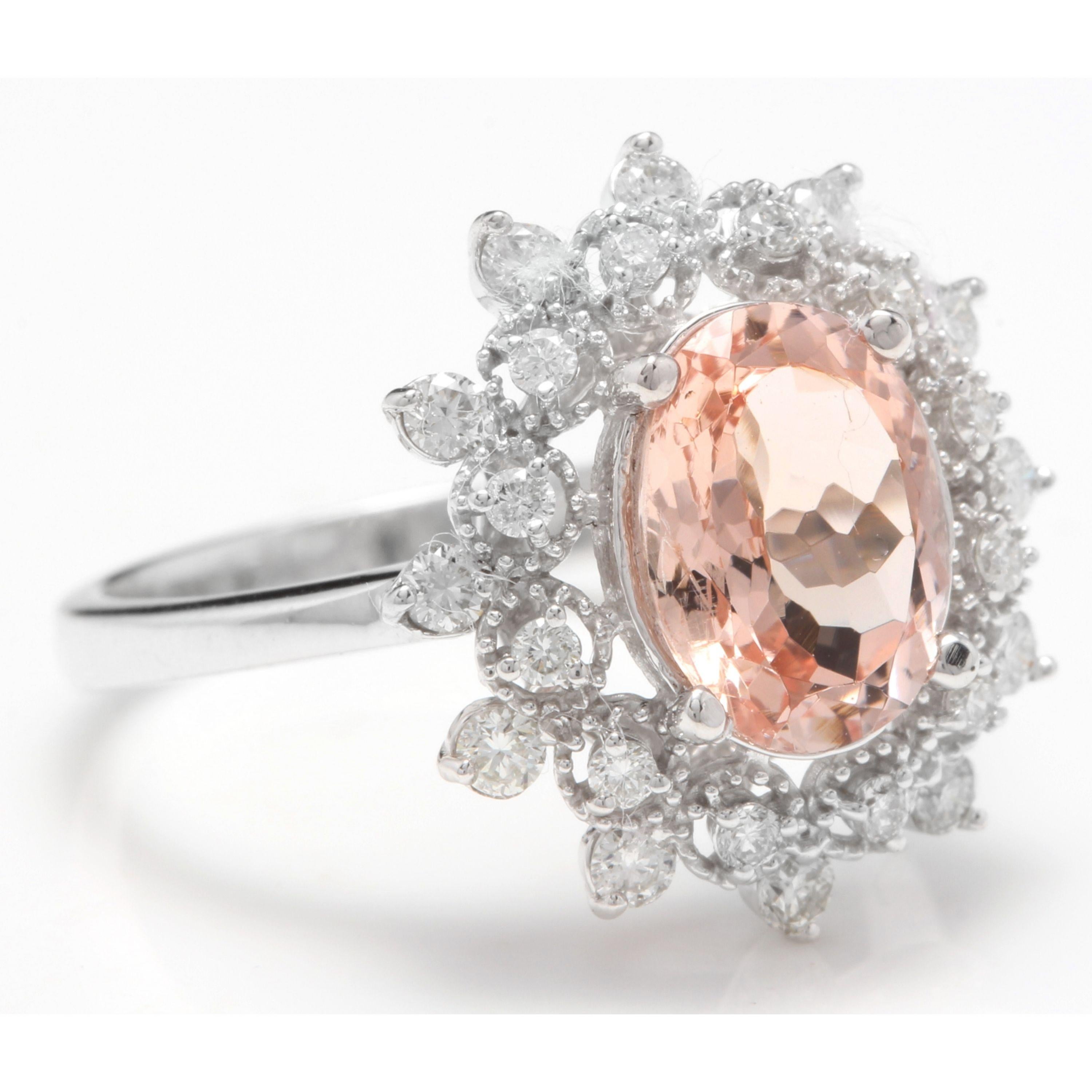 2.65 Carats Impressive Natural Morganite and Diamond 14K Solid White Gold Ring

Total Morganite Weight is: Approx. 2.00 Carats

Morganite Treatment: Heating

Morganite Measures: Approx. 10.00 x 7.50mm

Natural Round Diamonds Weight: Approx. 0.65